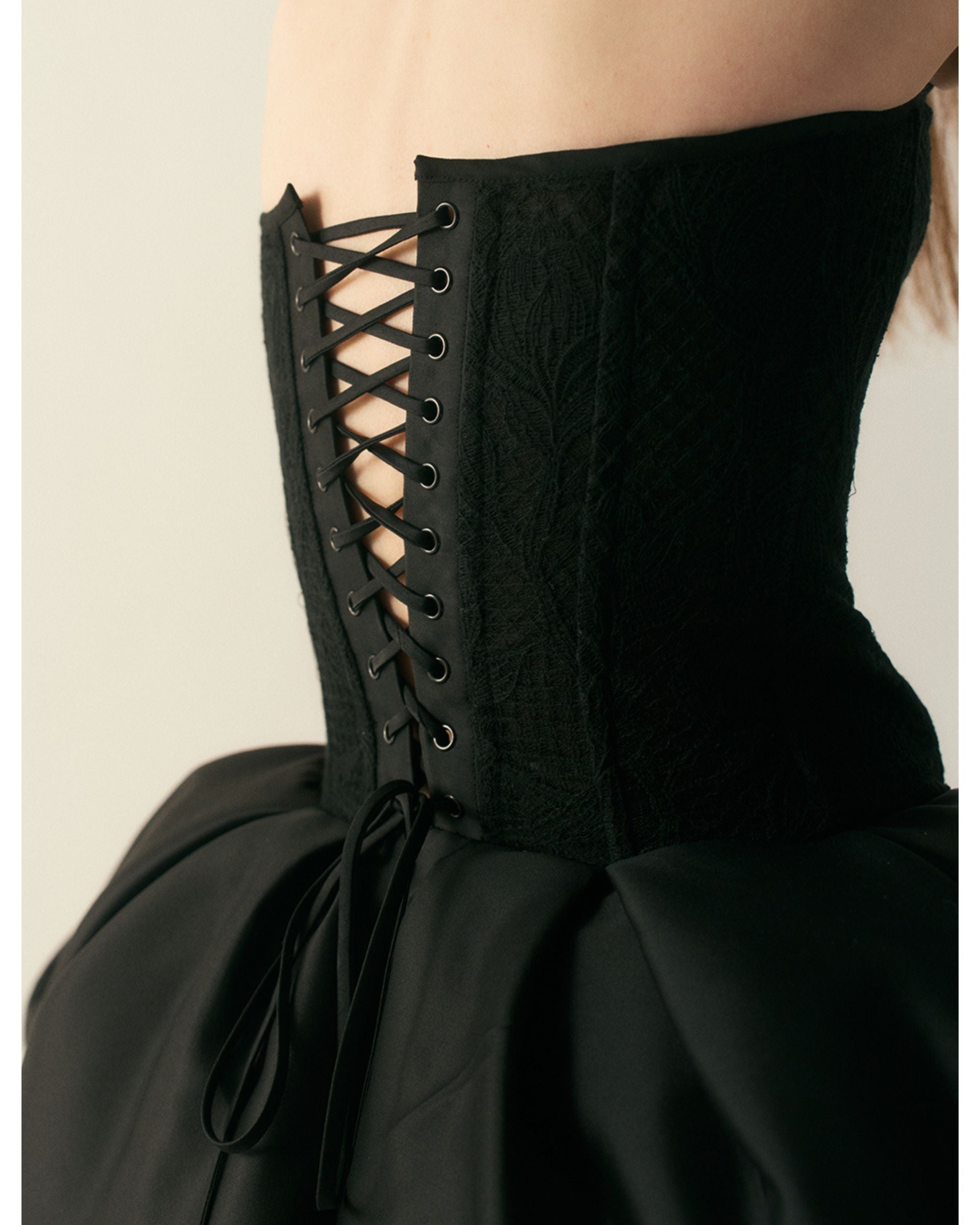 Back view of the Stemline Corset Silk Gown showing lace-up corset detail
