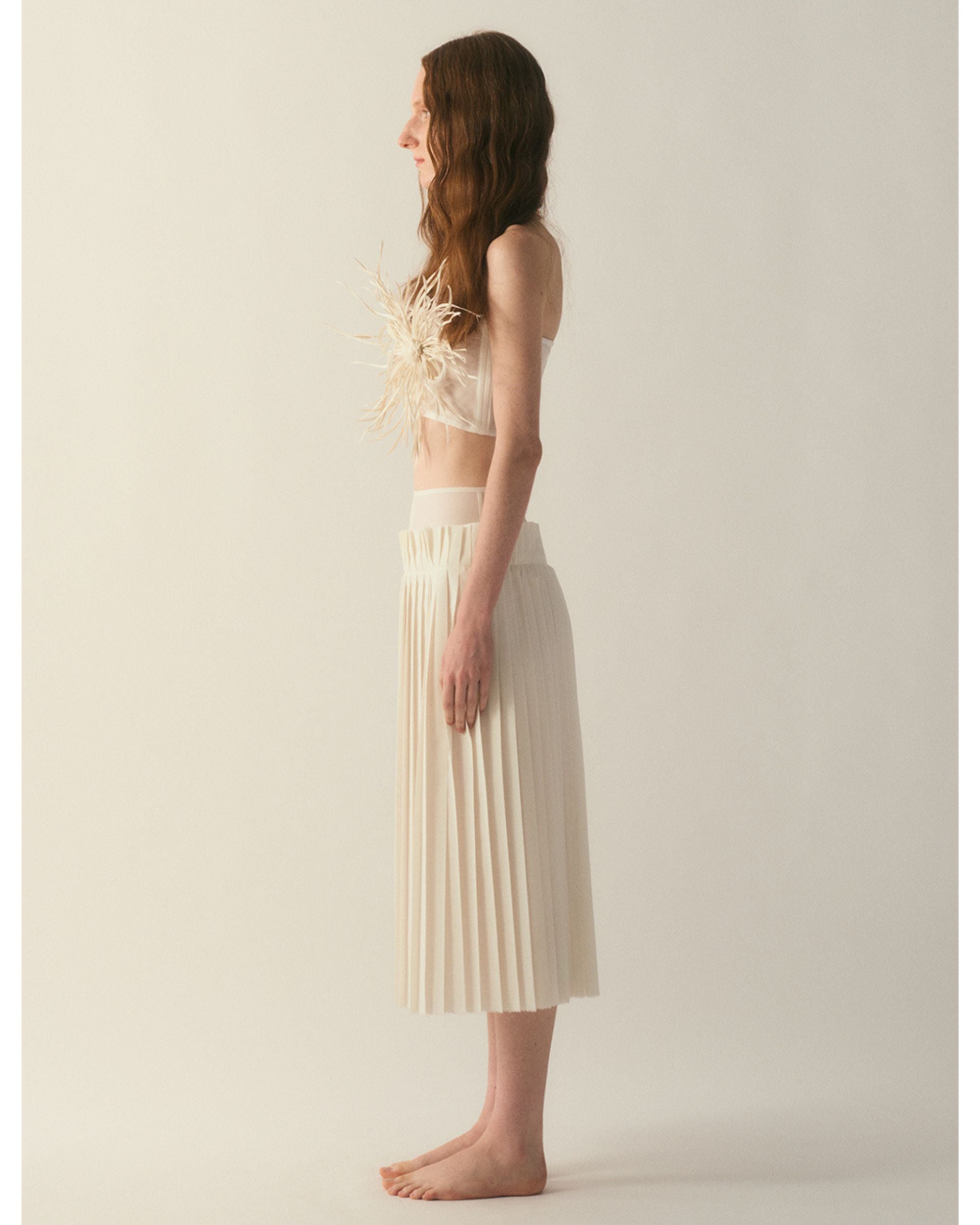 Side profile of the Altiora Corset Top highlighting the strapless neckline and sculpted fit through the bodice