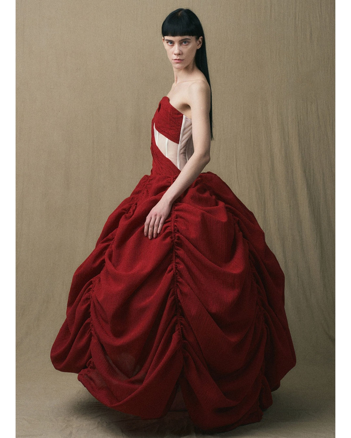 JINSUN Cut Out Bustier Evening Gown in deep red, angled view