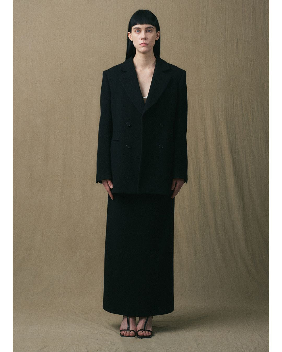 Front view of the JINSUN Double-Breasted Wool Jacket in black