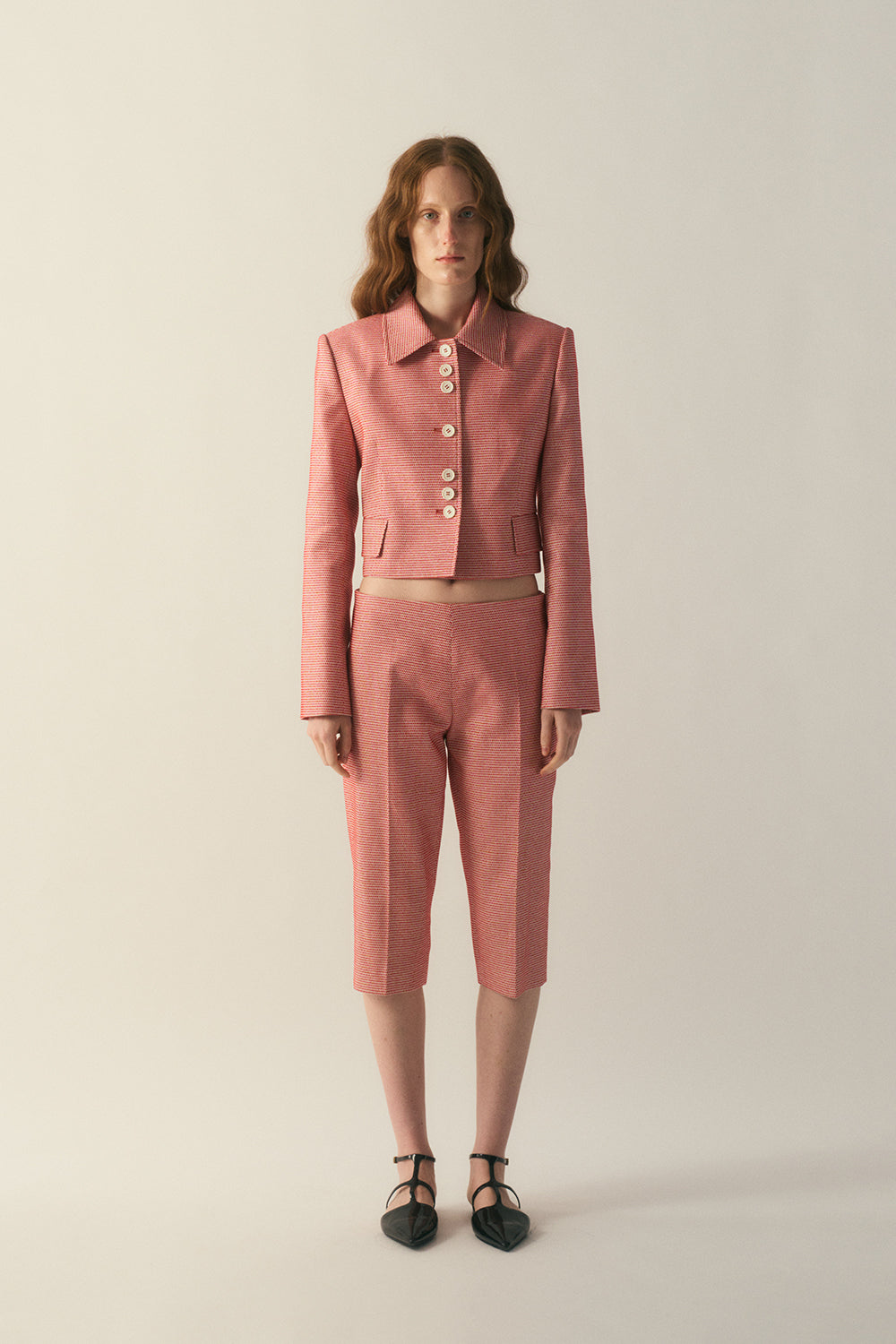 Front view of the Veyra Wool Silk Jacket in a cropped tailored silhouette
