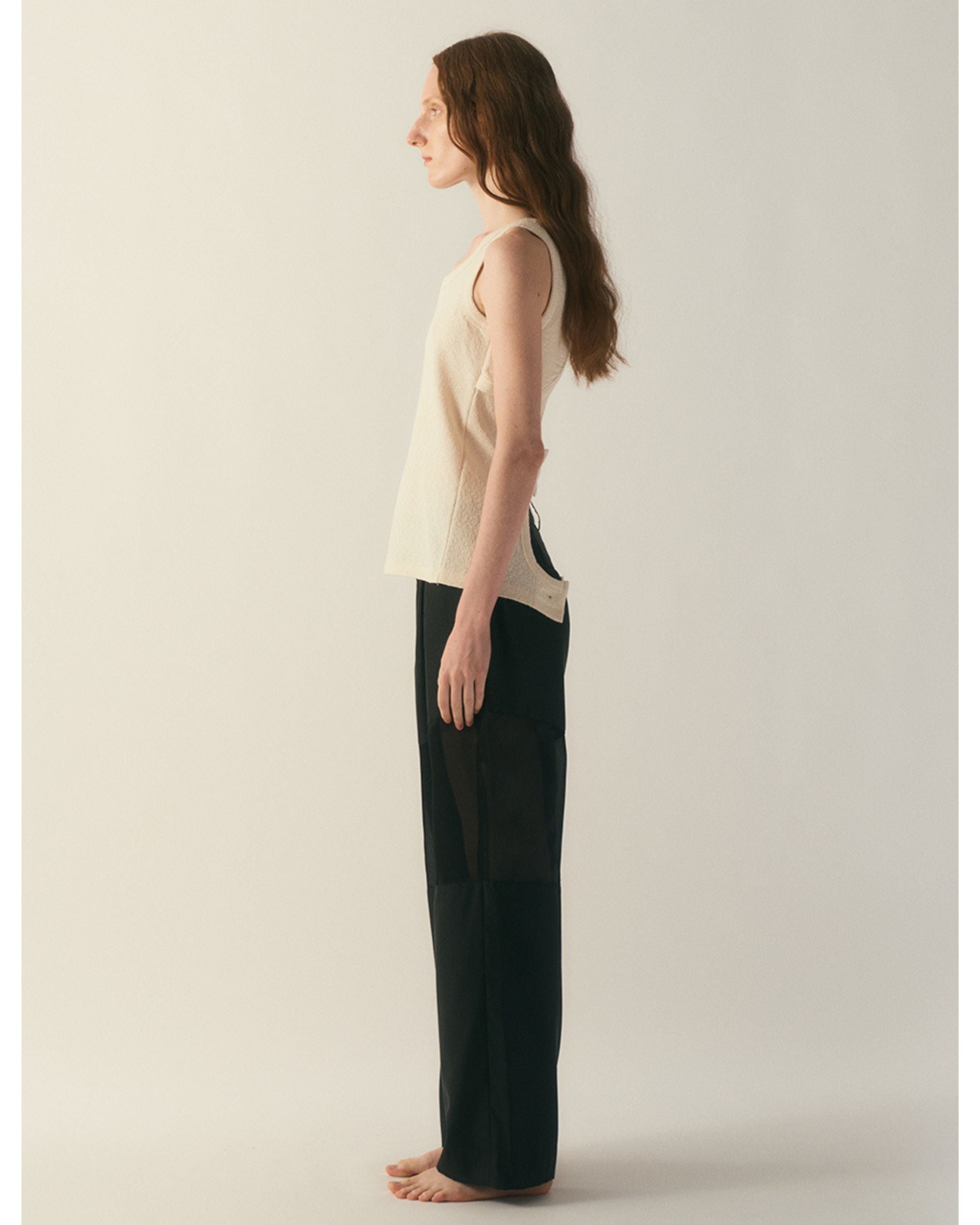 Side view of straight-fit jersey top in cream wool blend
