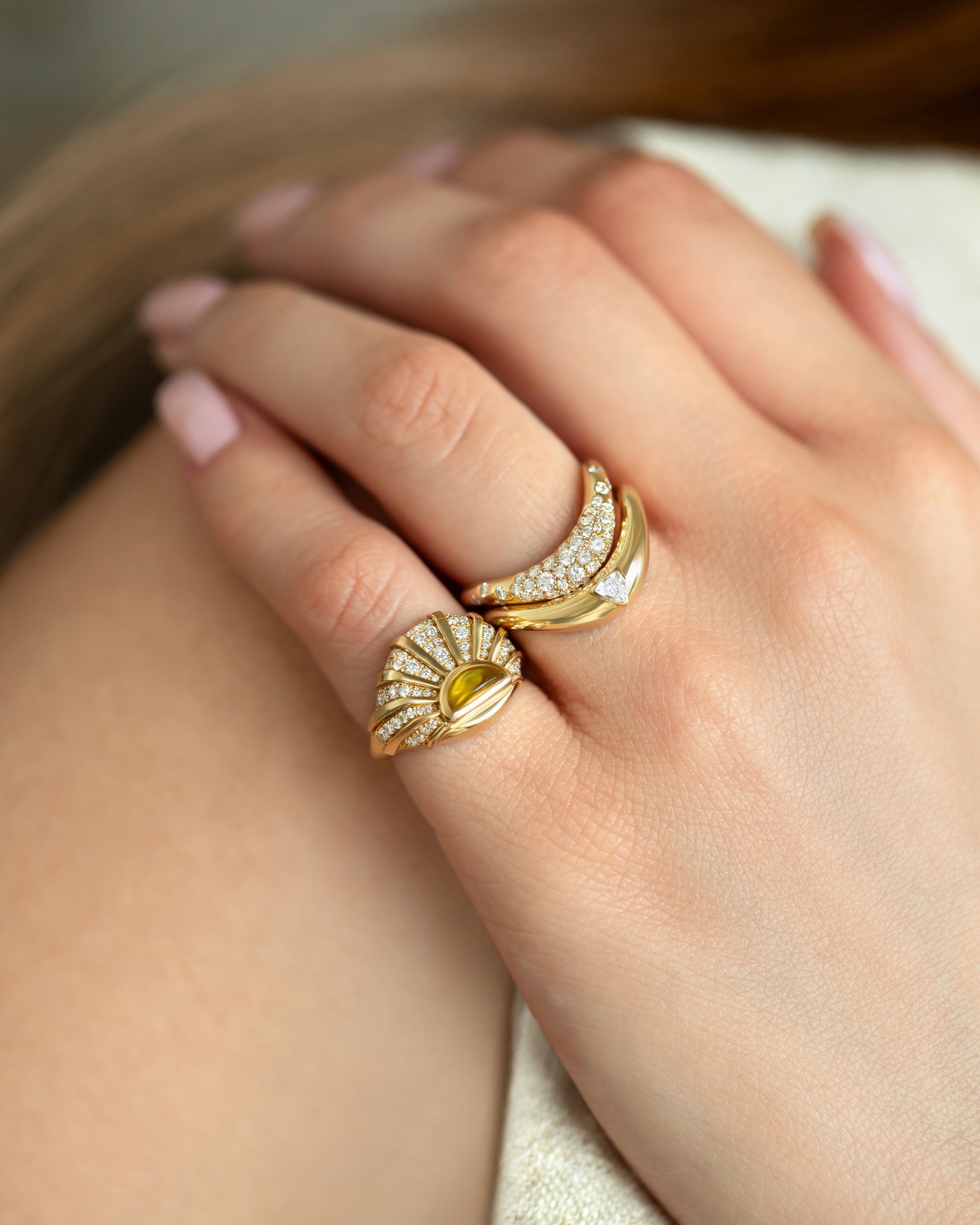 L’Atelier Nawbar Boa Rings Stack — mixed styling — hand close-up
