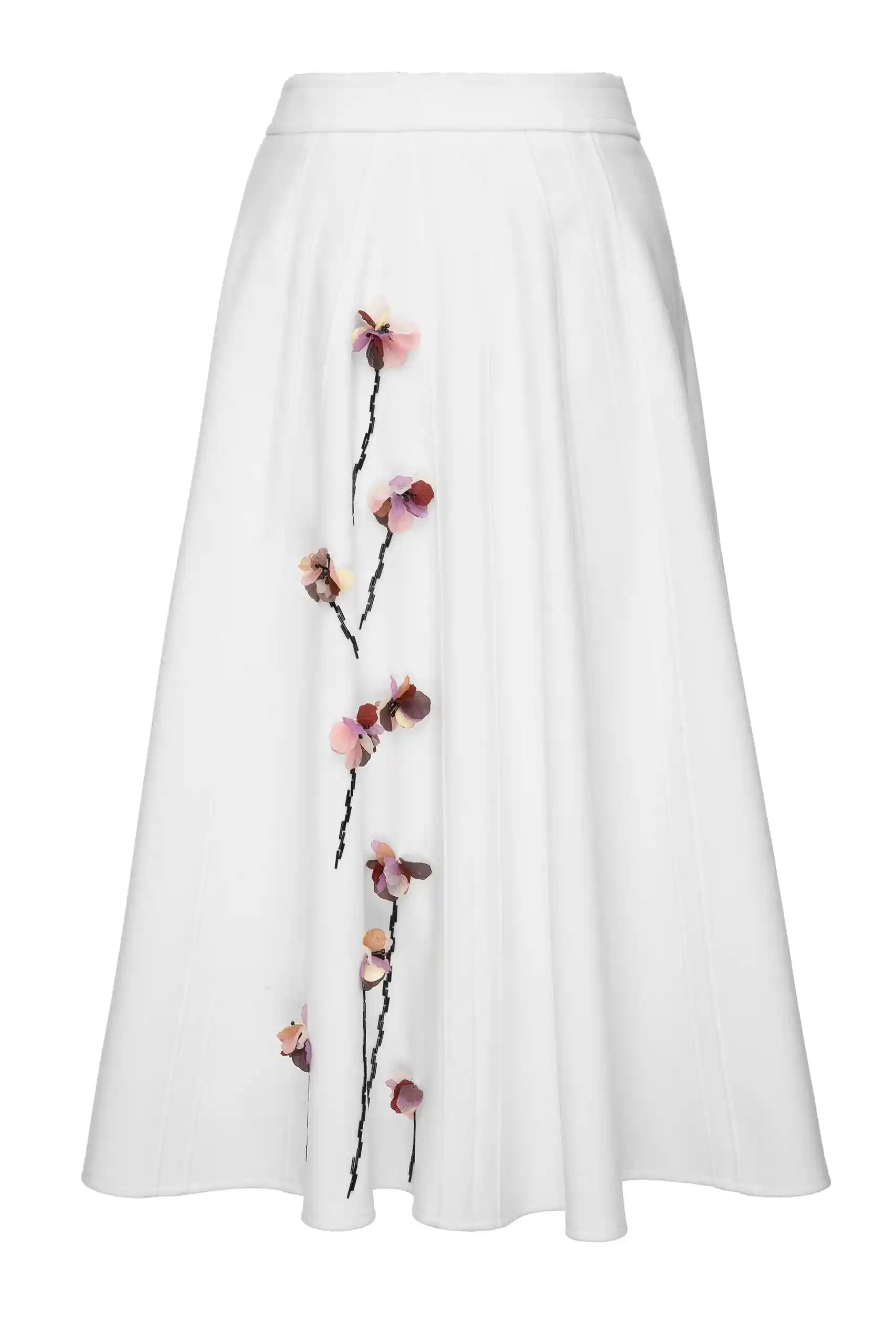 White wool midi skirt with floral appliqué detailing on the front