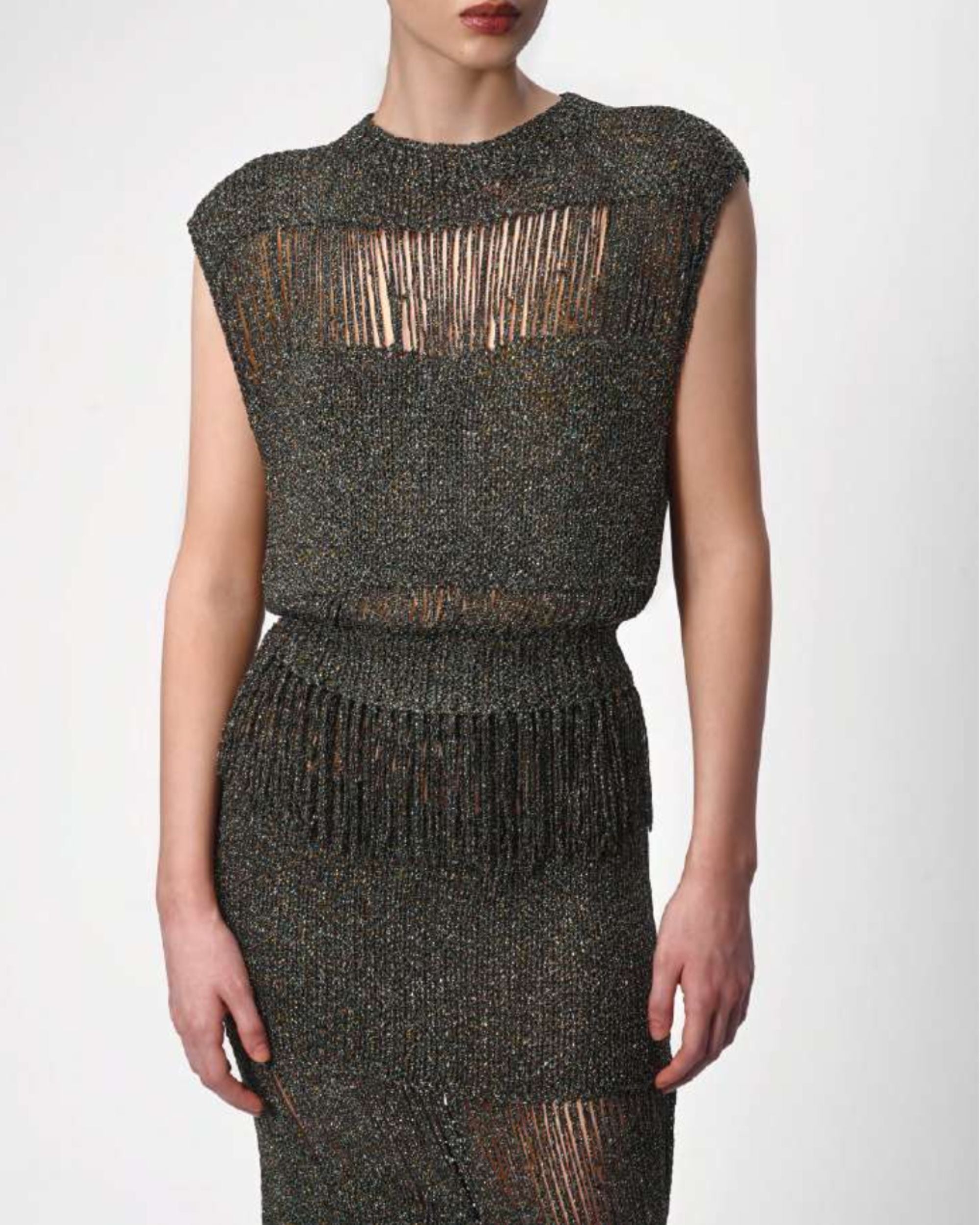 Front view of sleeveless cotton blend knit top with fringe panels