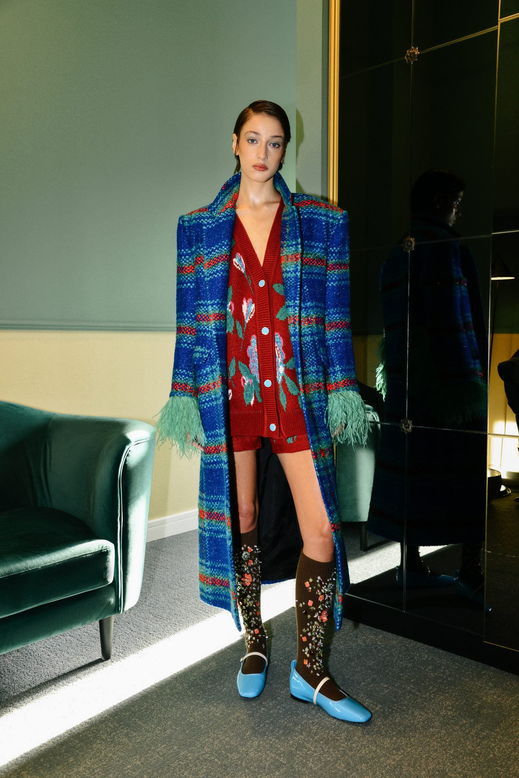 Full-length styled look featuring the Red Sequence Cardigan layered with coordinating pieces