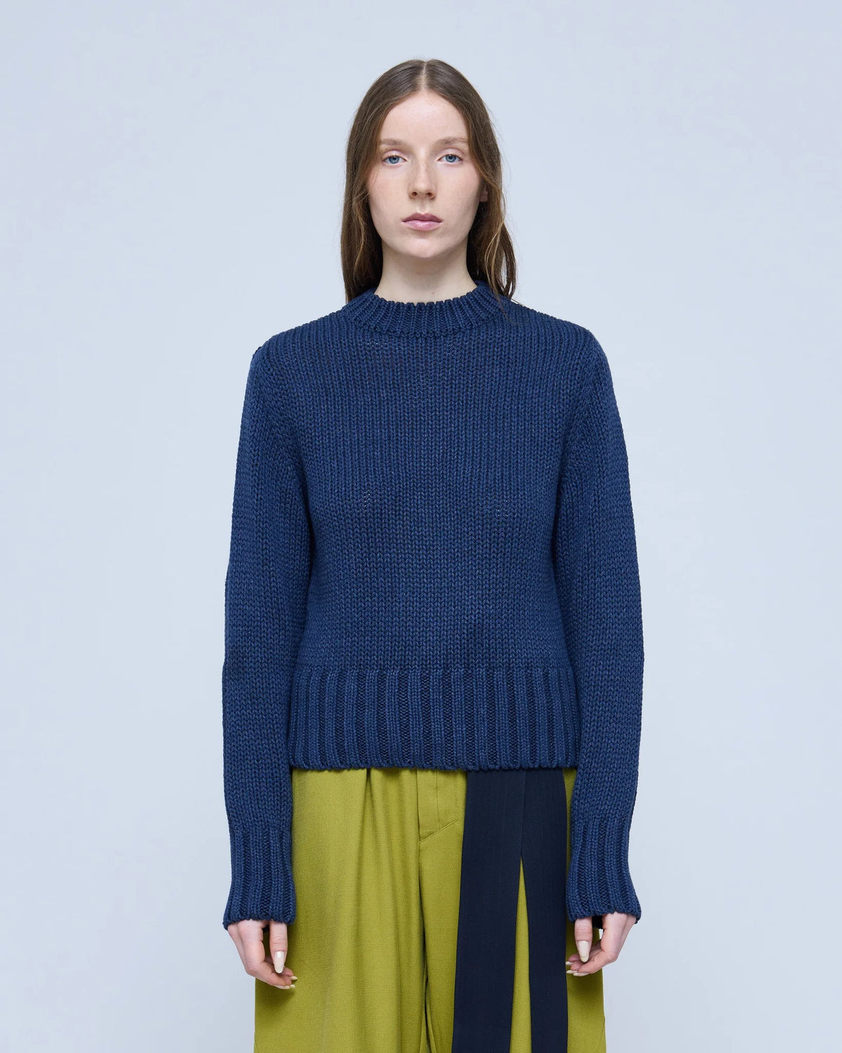 Front view showing the cropped fit of the MARTAN Floyd Sweater in anthracite blue