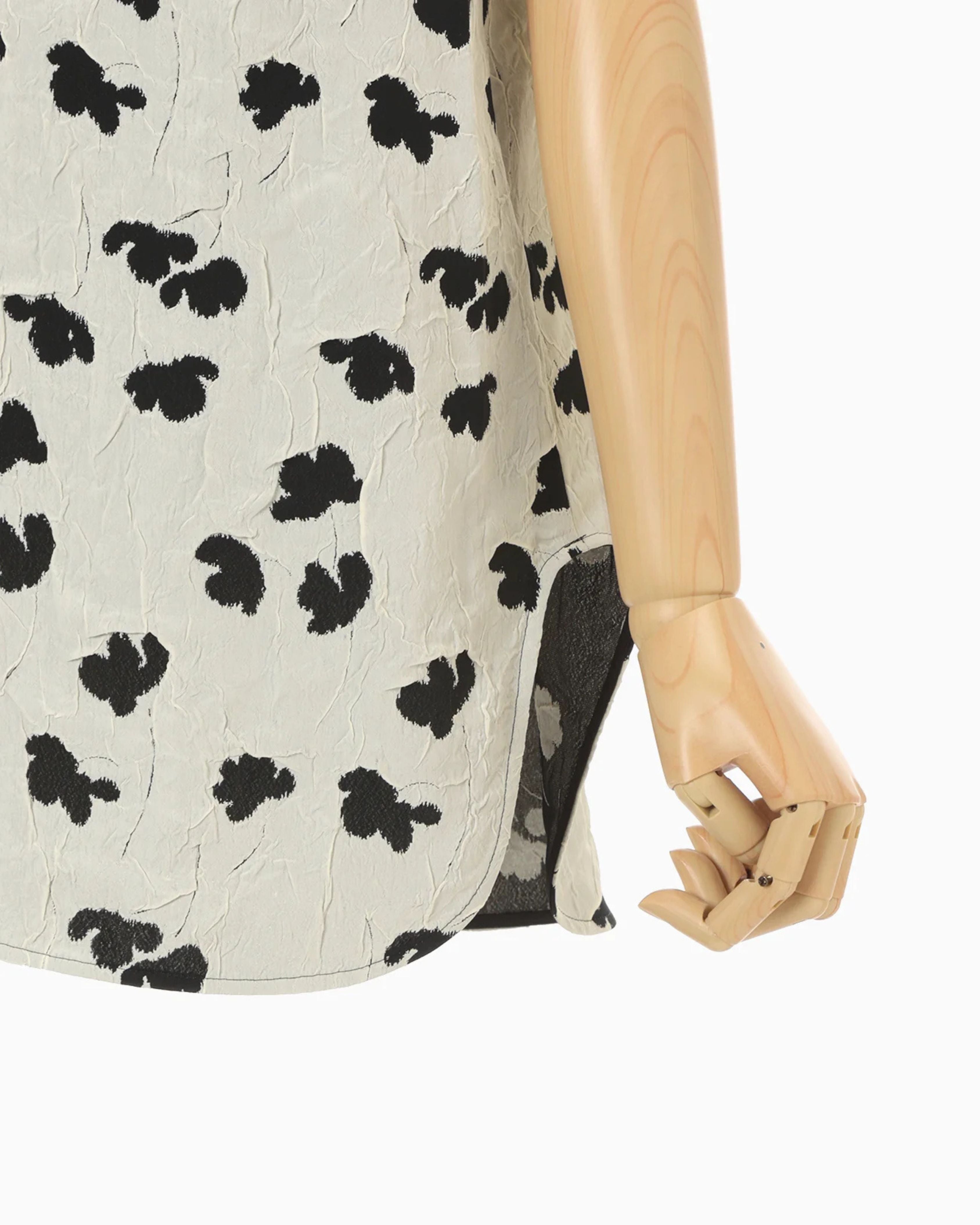 Mame Kurogouchi Double Layered Floral Jacquard Camisole in Ecru — detail view of jacquard texture and hem