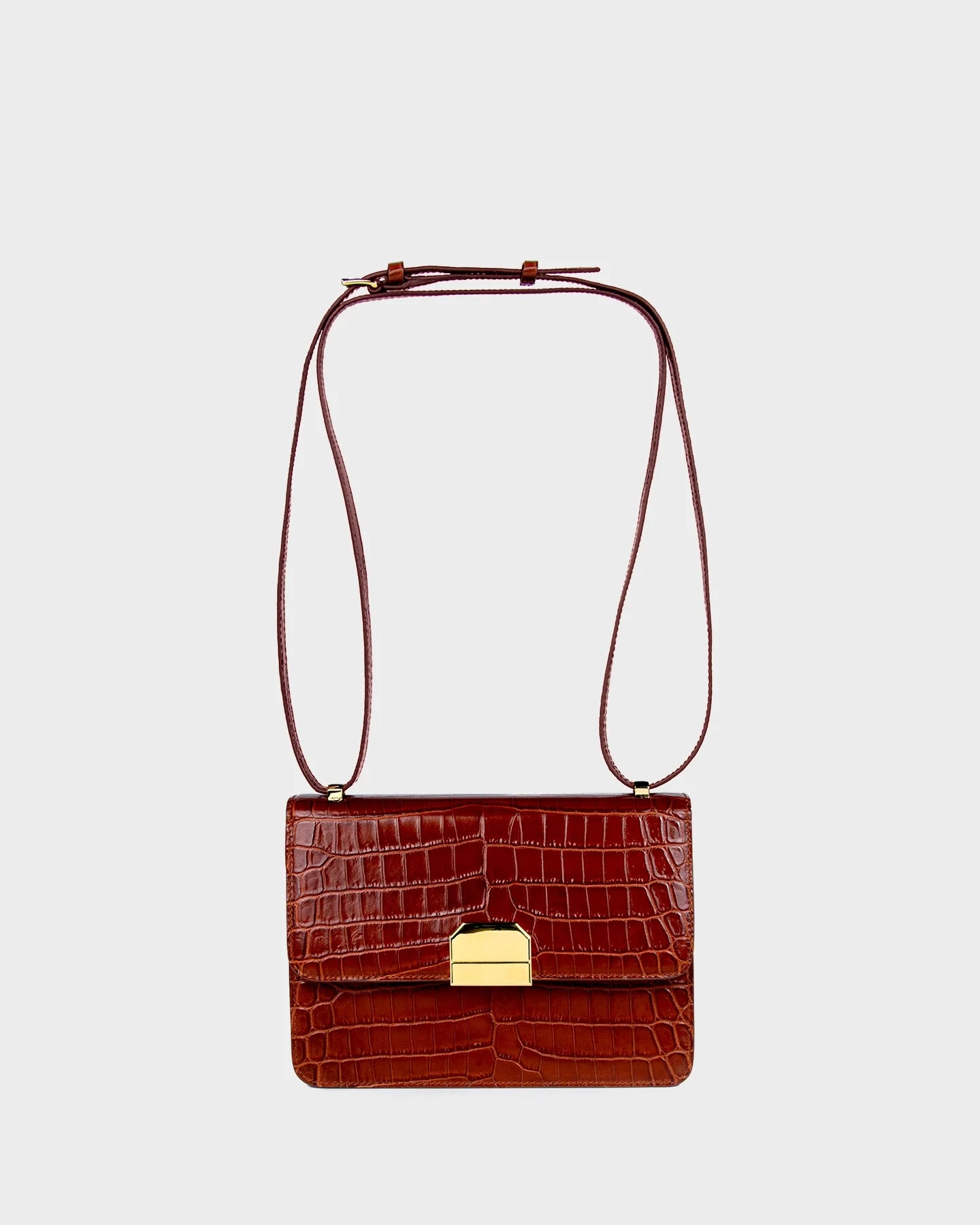 Alex caramel handbag with adjustable strap – full front view with strap.