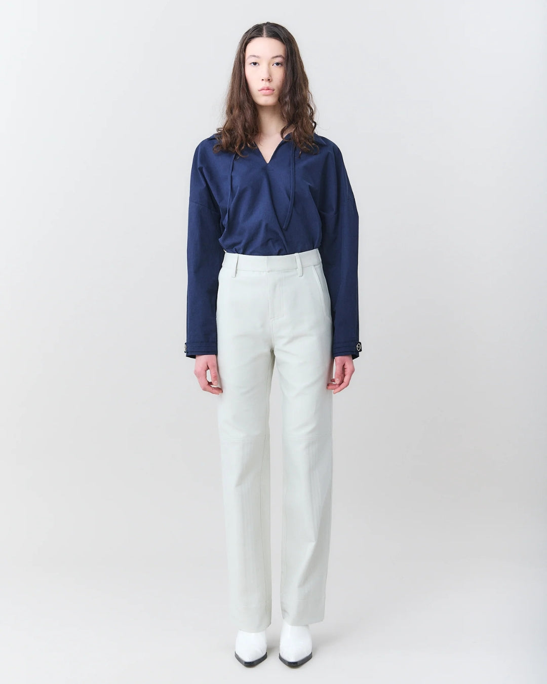 MARTAN Jelle Trousers in ice grey, full length front view on model styled with navy blue blouse