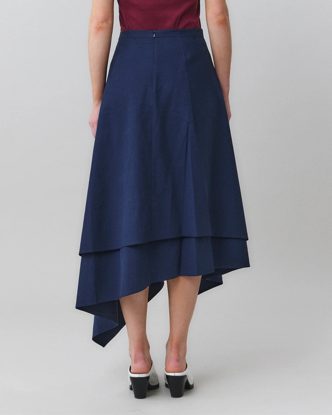MARTAN Laurie Skirt, back view showing staggered layered hem and asymmetric construction