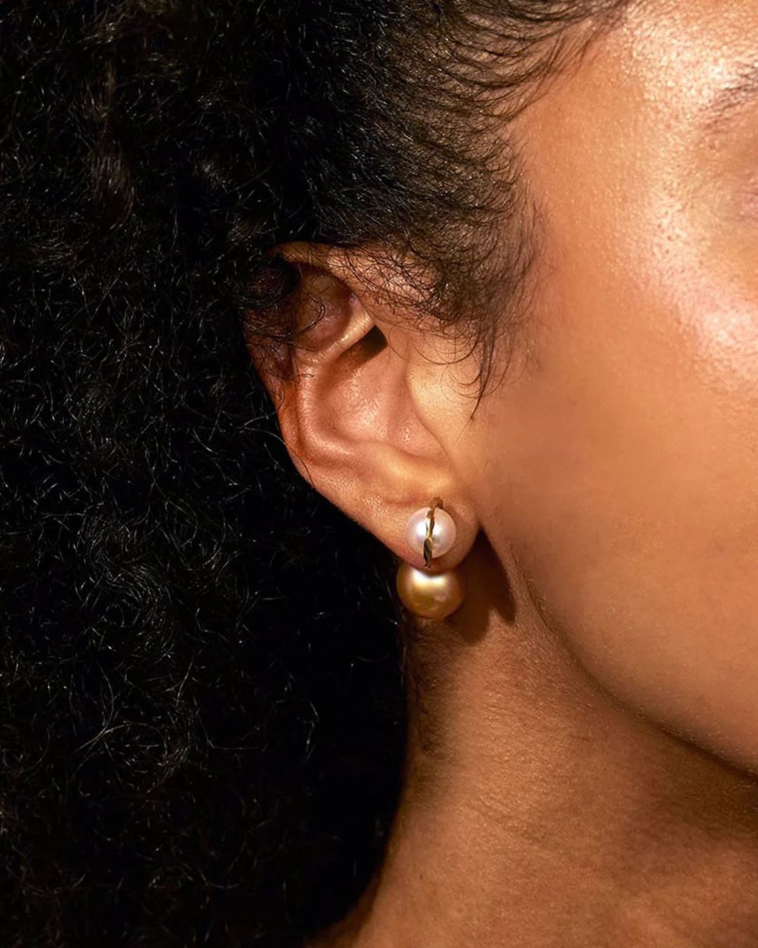 Model wearing the Milamore Kintsugi Duo Pearl Earring with a Gold South Sea pearl.