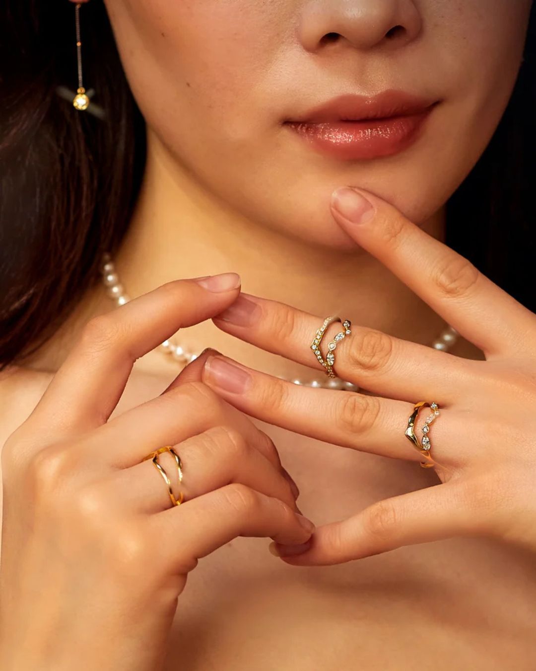 Milamore Kintsugi Float Diamond Ring I styled with coordinating gold and diamond rings.