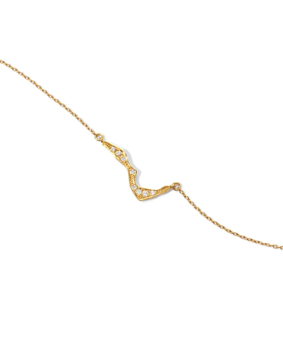 Angled close-up of the sculptural diamond-set Kintsugi pendant and fine gold chain.