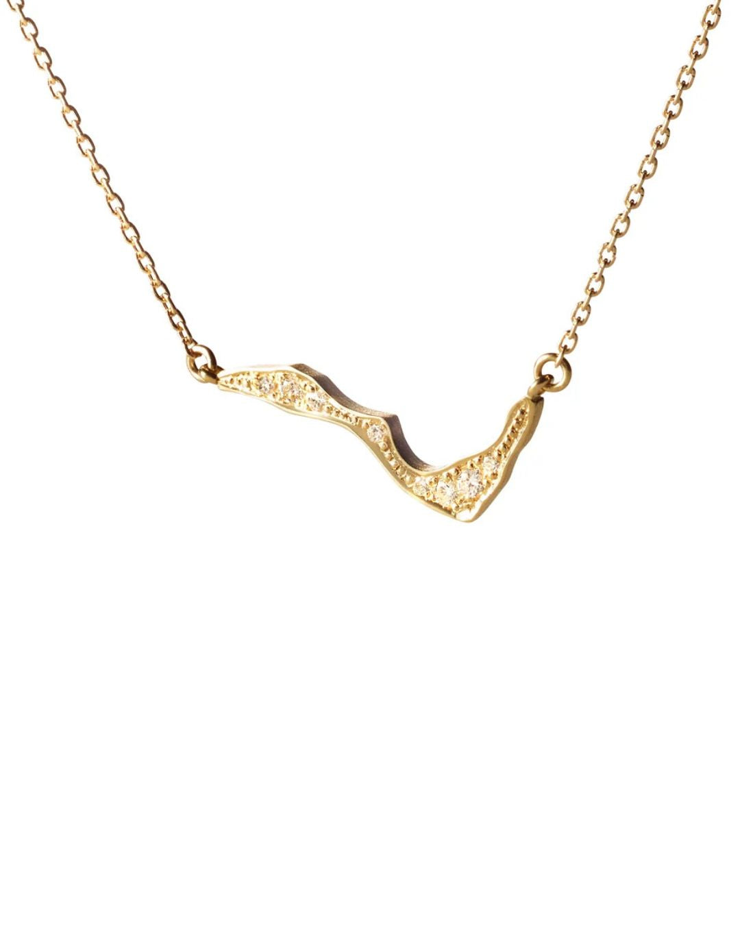 Close-up of the Milamore Kintsugi Mini Pavé Necklace pendant in 18K yellow gold with natural diamonds.