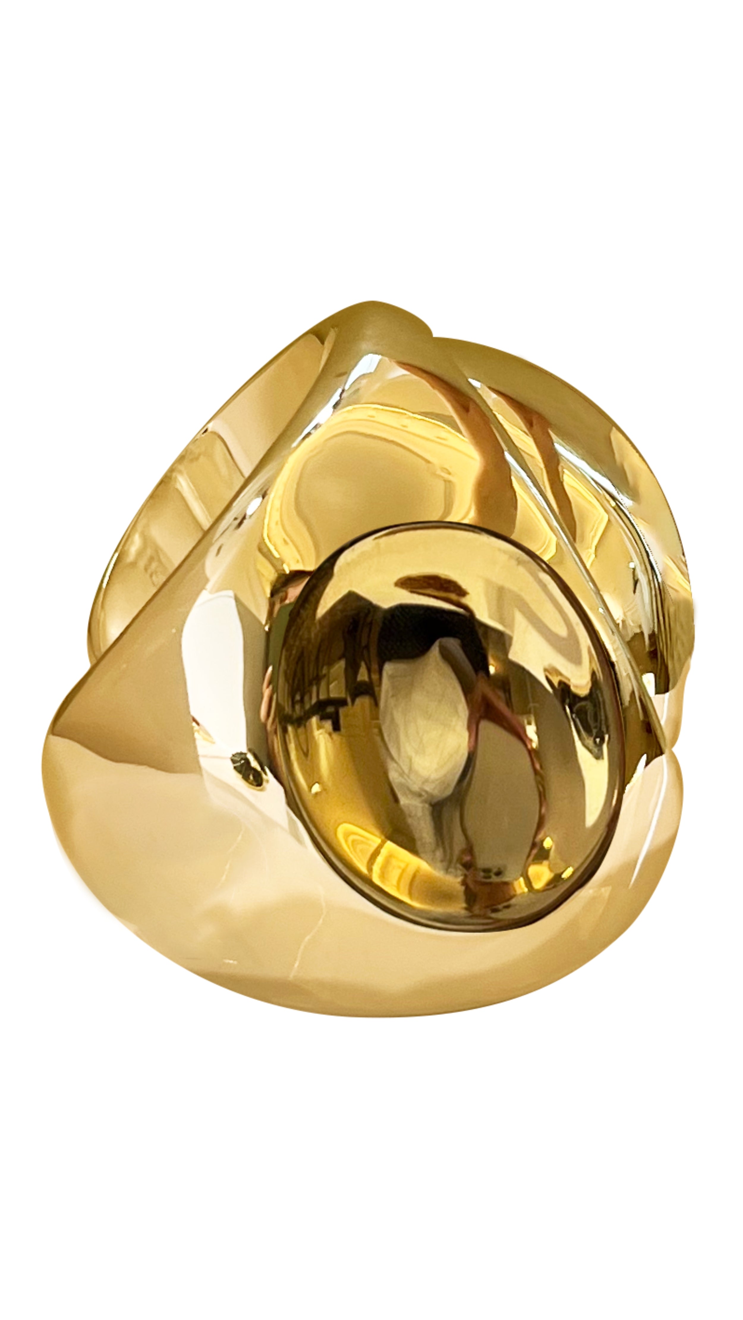 Monica Sordo Cubagua Cuff Bracelet is a statement piece crafted in beautiful organic shaped 24 carat plated gold. Photo shows cuff bracelet from the the side. Sustainable and fair trade jewelry.