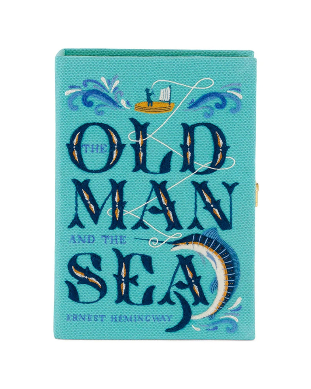 Full front face of the Old Man and the Sea clutch on white, showing the complete hand-embroidered cover with large-scale navy lettering, fisherman, wave scrolls and leaping marlin on teal cotton.