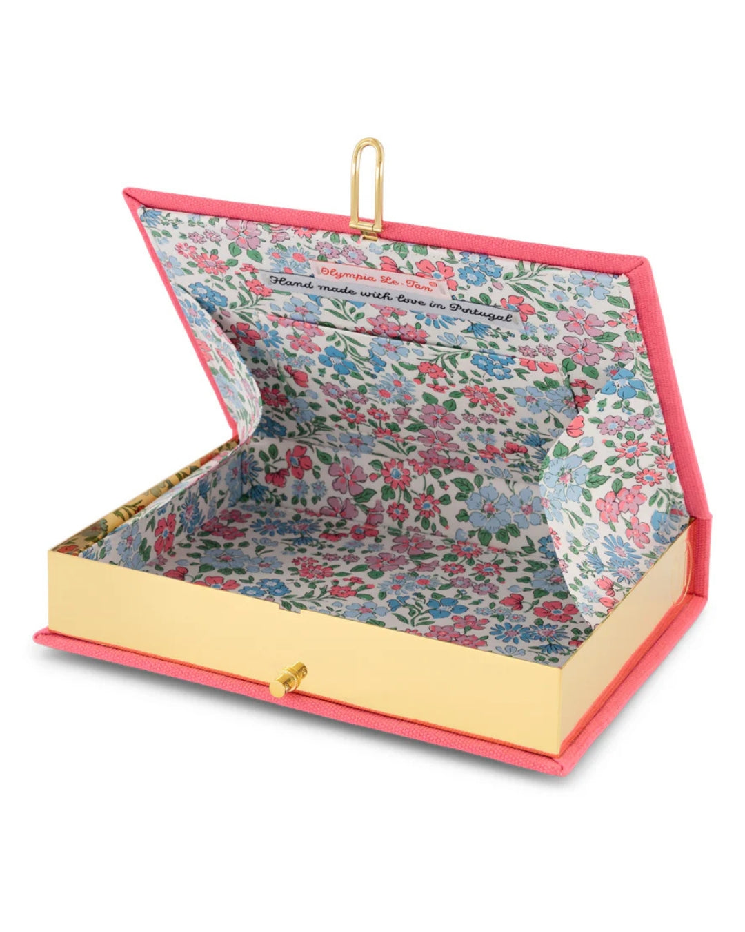 Interior view of the Jannah clutch open, showing the gold-tone stainless steel frame, kiss-lock clasp, and unique multicoloured floral printed fabric lining with Olympia Le-Tan label reading "Hand made with love in Portugal."