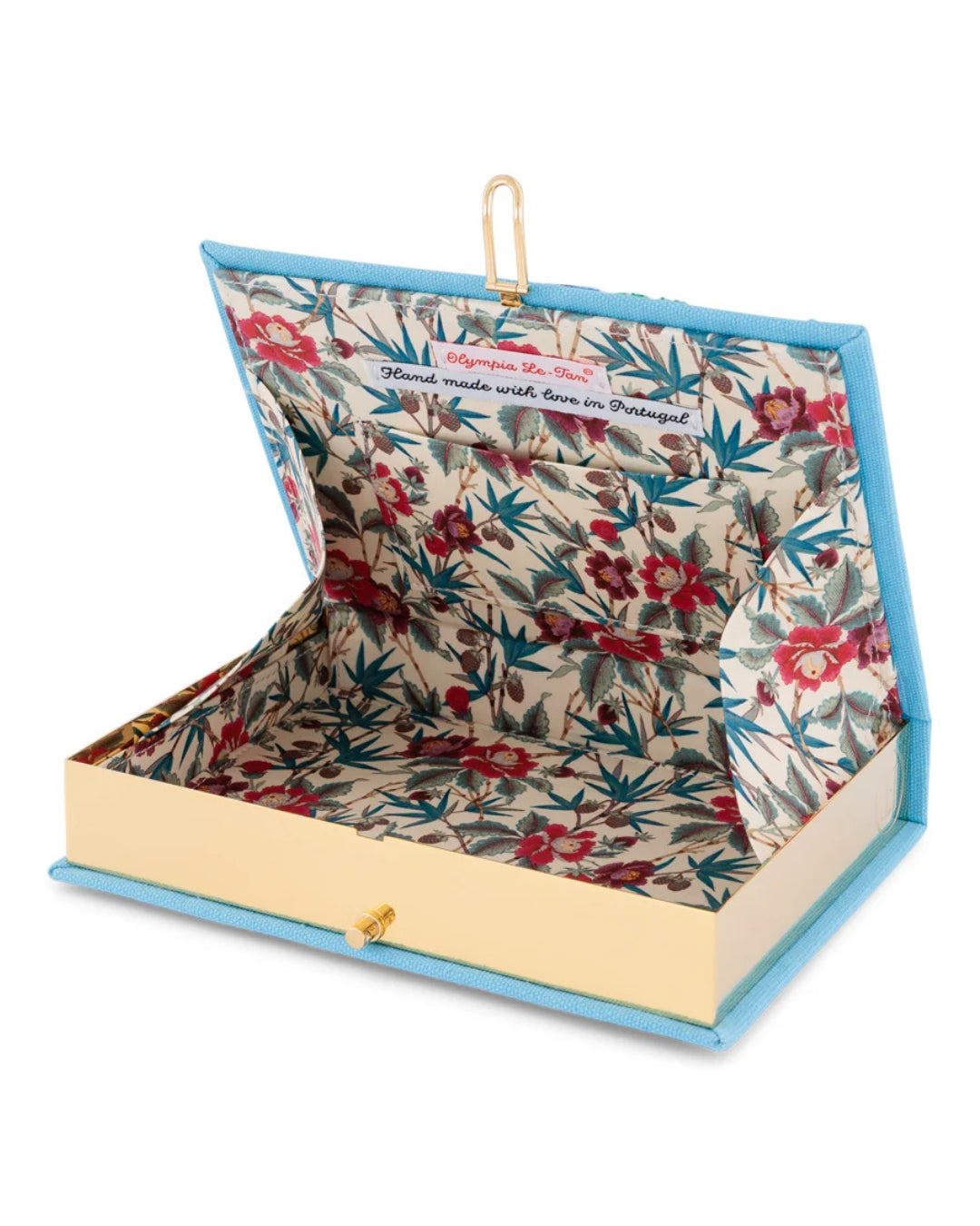 Olympia Le-Tan Marbella book clutch open interior view showing unique floral printed lining and gold frame hardware