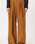 Plan C Camel Boyfriend Trouser in Nylon. Slightly oversized style with high waist and double button front closure. Pleated front panels and loose fit. Photo shown on model facing front.