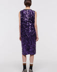 Plan C Color Block Sequin Dress. Sleeveless racer back style midi length dress in purple and lime green. Trimmed in black at the neckline and arms. The green sequins form a v shape in the front. Shown on model facing back.