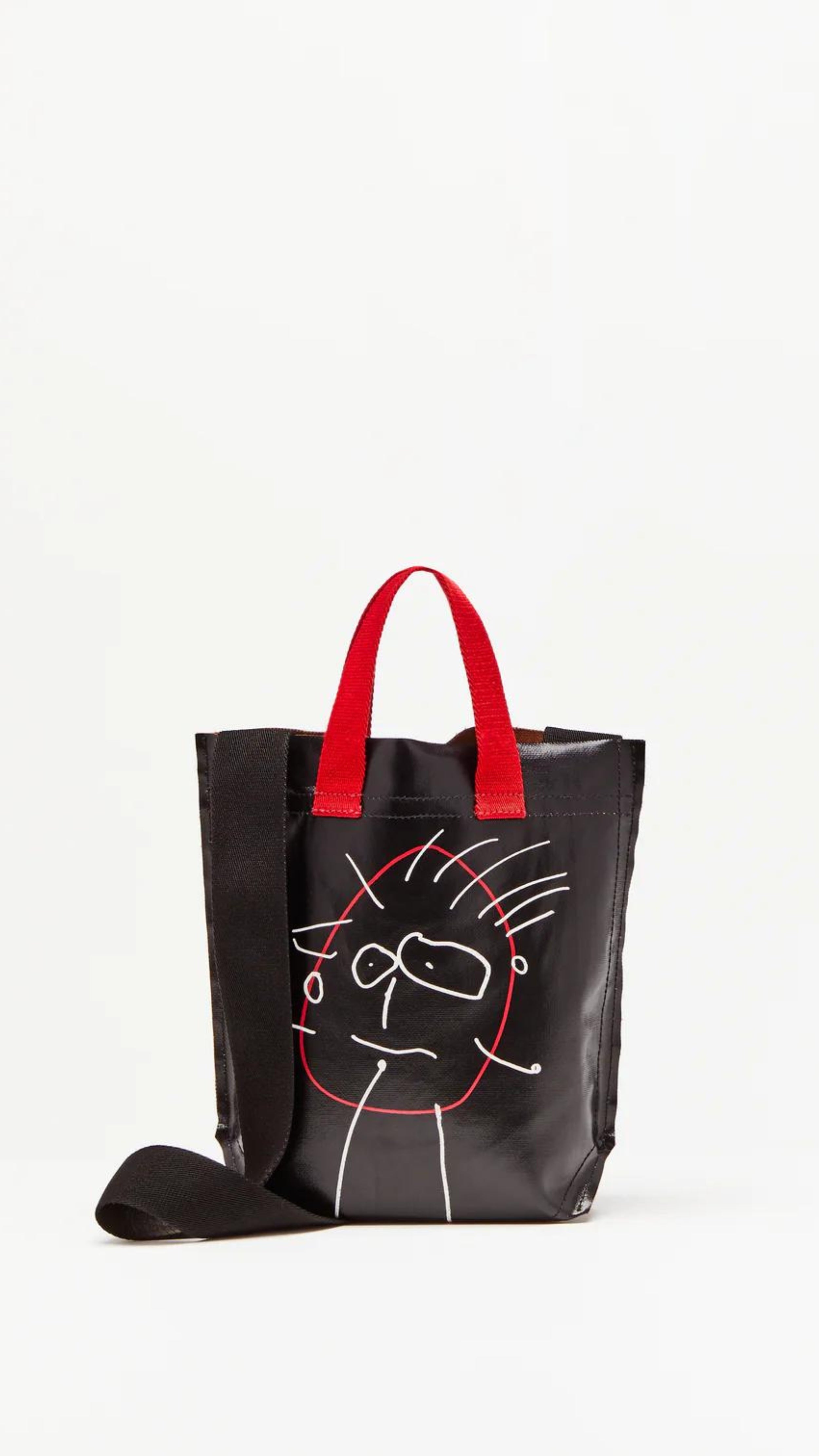 Plan C Pili and Bianca Black Mini Shopper. Coated canvas mini shopper style bag with whimsical drawings on either side. Completed with a red handle strap and a long black strap. Shown from front view.