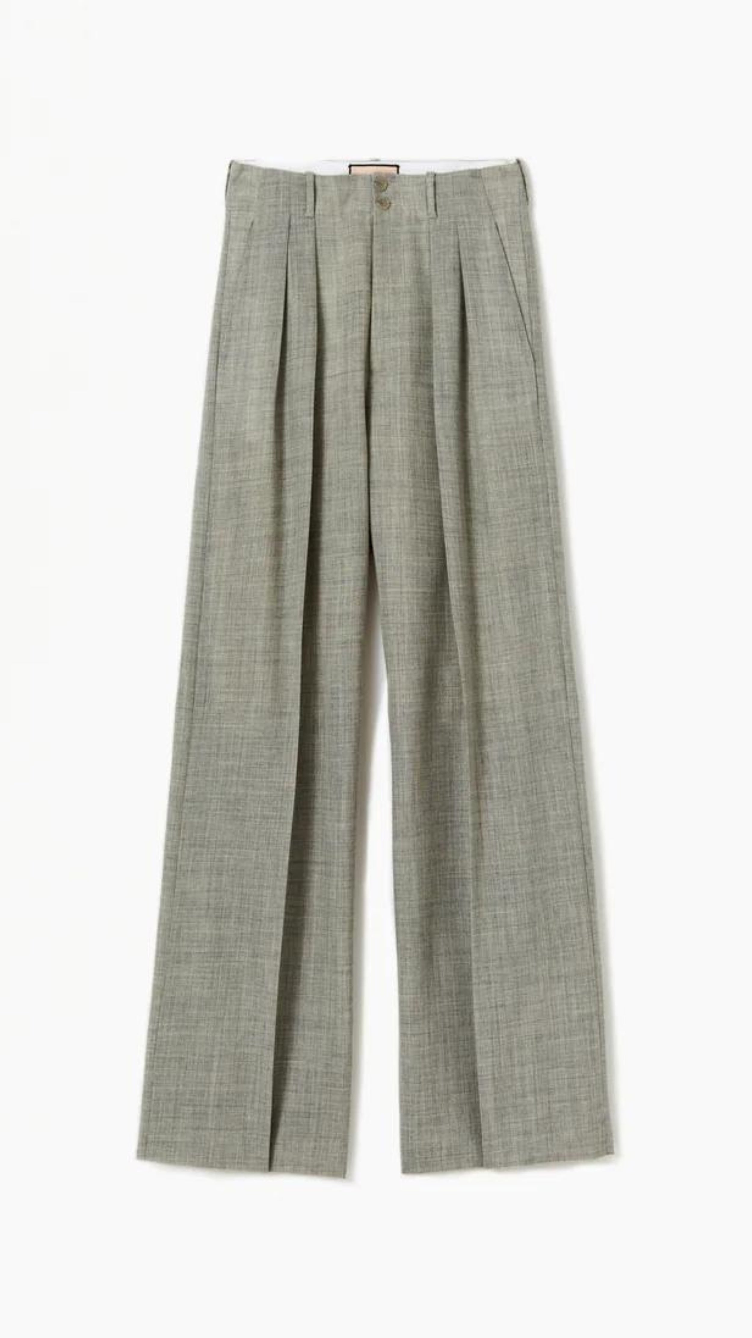Plan C Pleated Melange Wide Leg Pants. tailored-cut and high-rise fit and wide leg trouser. With double pleating, button fastening closure, and pockets. Made in Italy from a light weight grey melange wool panama weave. Product photo shown from the front.