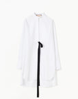 Plan C White Sartorial Poplin Shirt. Classic with a twist long white poplin blouse with front buttons. An added black ribbon detail in the front. Oversized cuffs at the long sleeves. Product photo shown from the front.