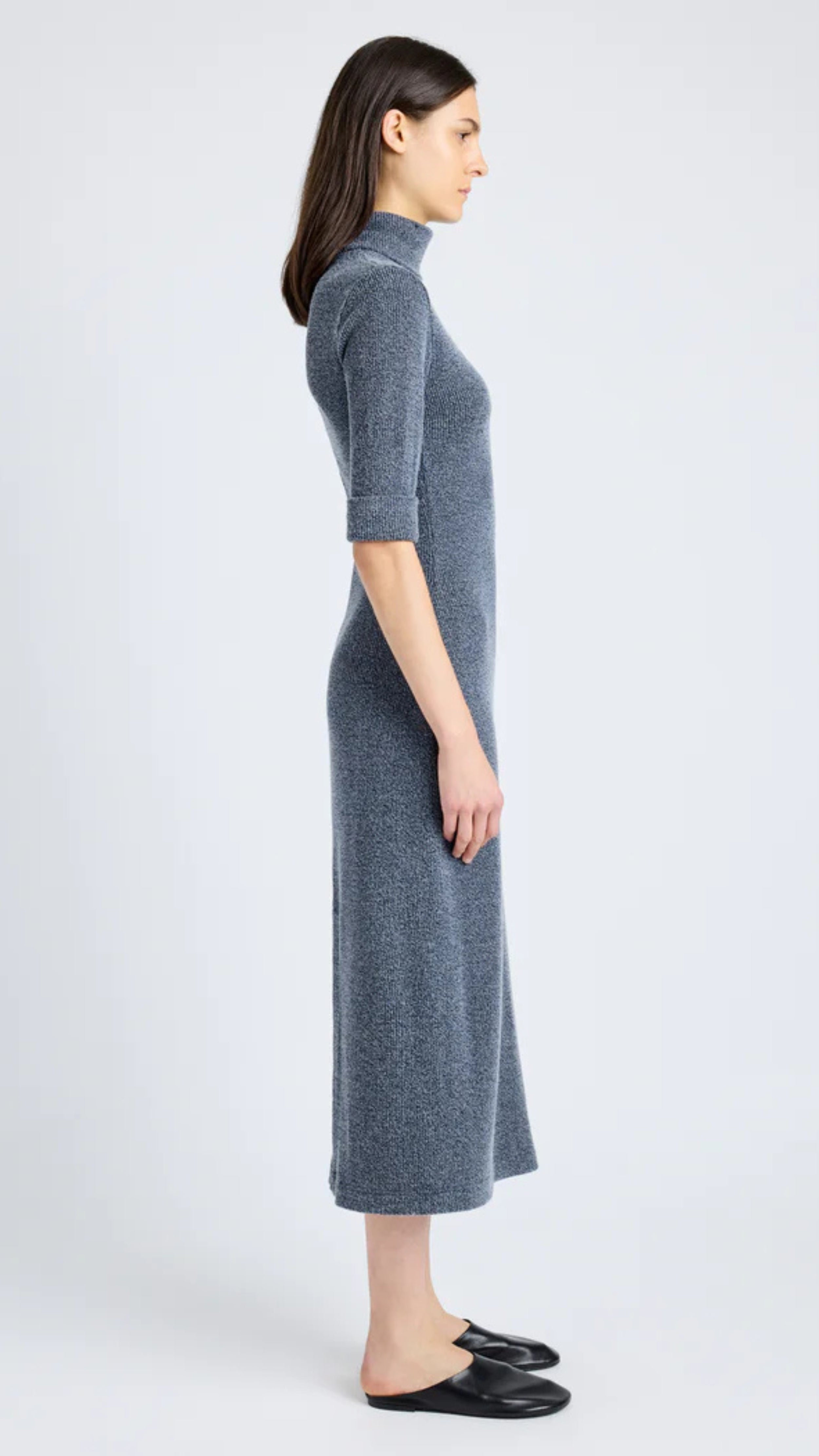 Grey blue boucle knit midi dress with mock turtle neckline, cap sleeves, slim silhouette, buttoned back placket, and center back slit.