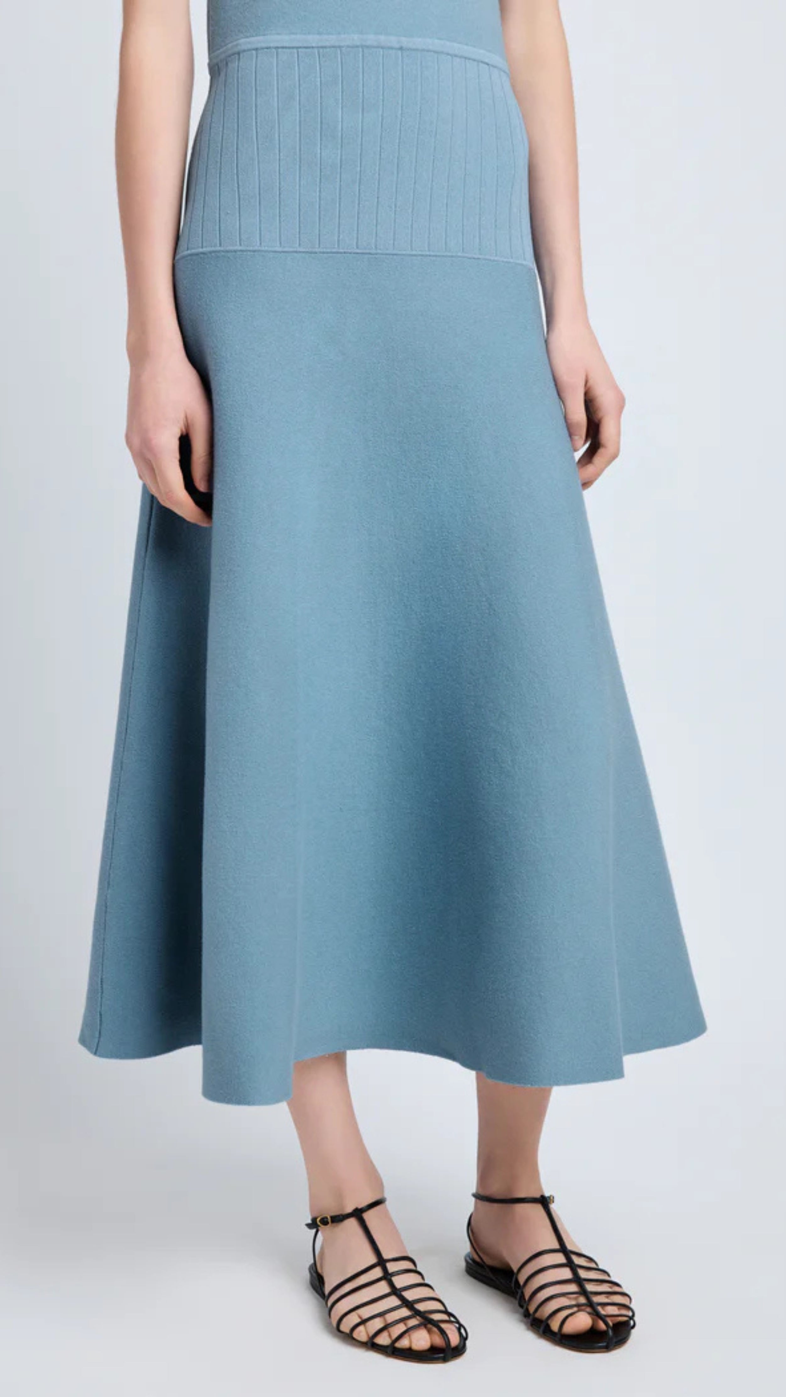 Lark blue midi-length Lucia Dress in souffle knit by Proenza Schouler, featuring sleeveless scoop neck and textured varying knits.