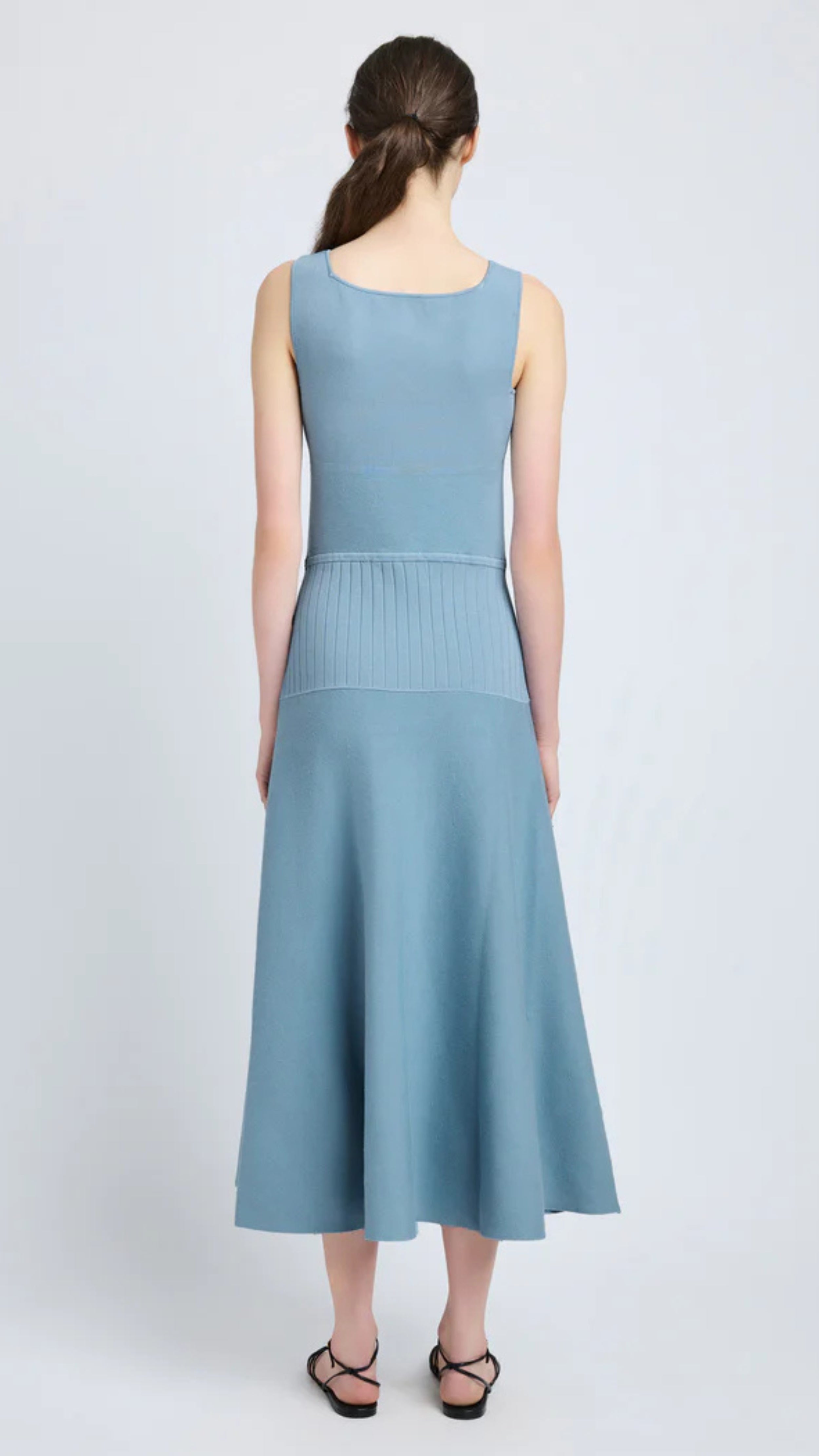 Lucia Dress in Lark Blue Souffle Knit with sleeveless scoop neck and midi length, featuring varying knit textures.