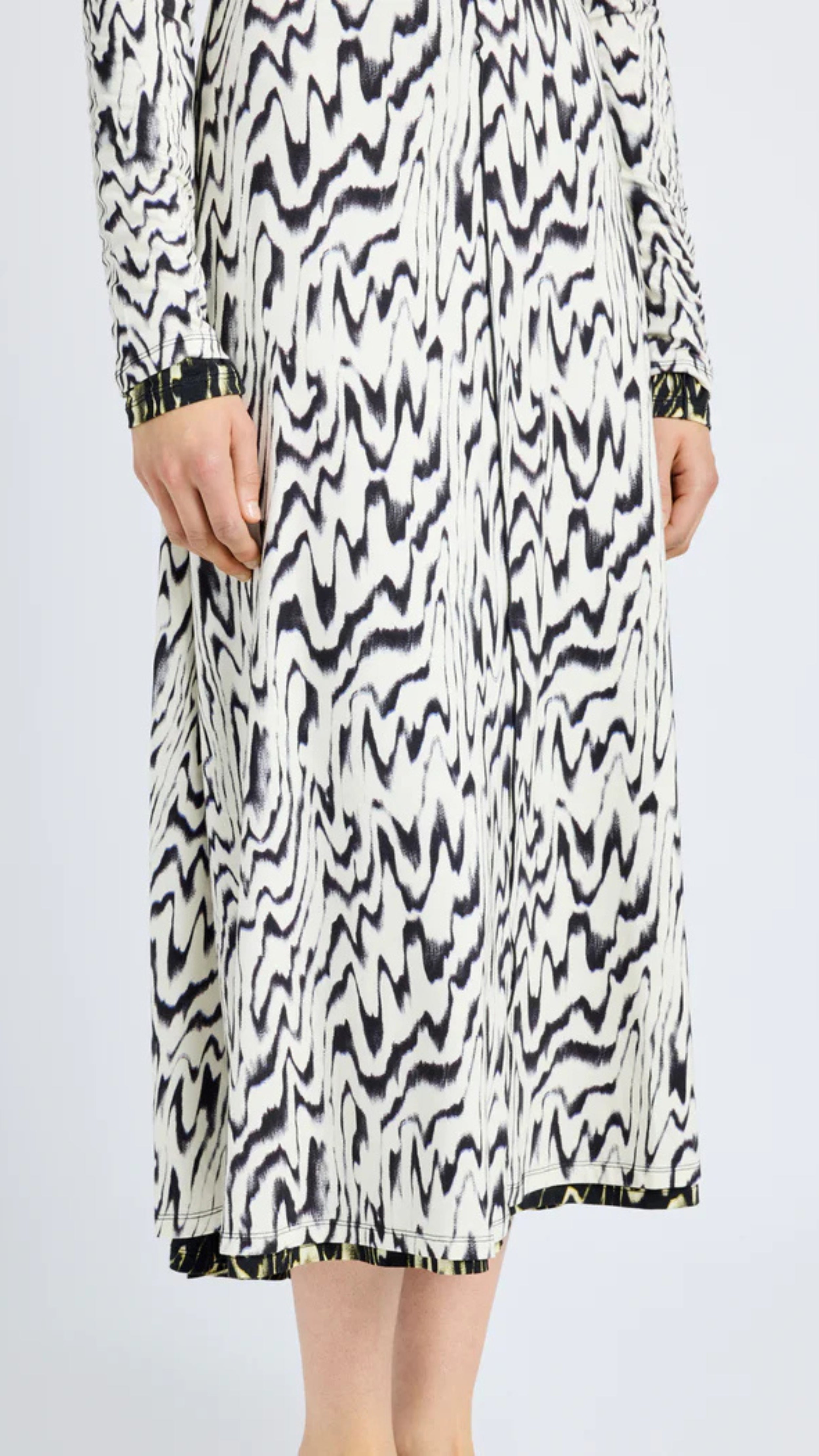 Marion Dress in Printed Jersey with black and white abstract design, folded neck, and long sleeves, Proenza Schouler style.