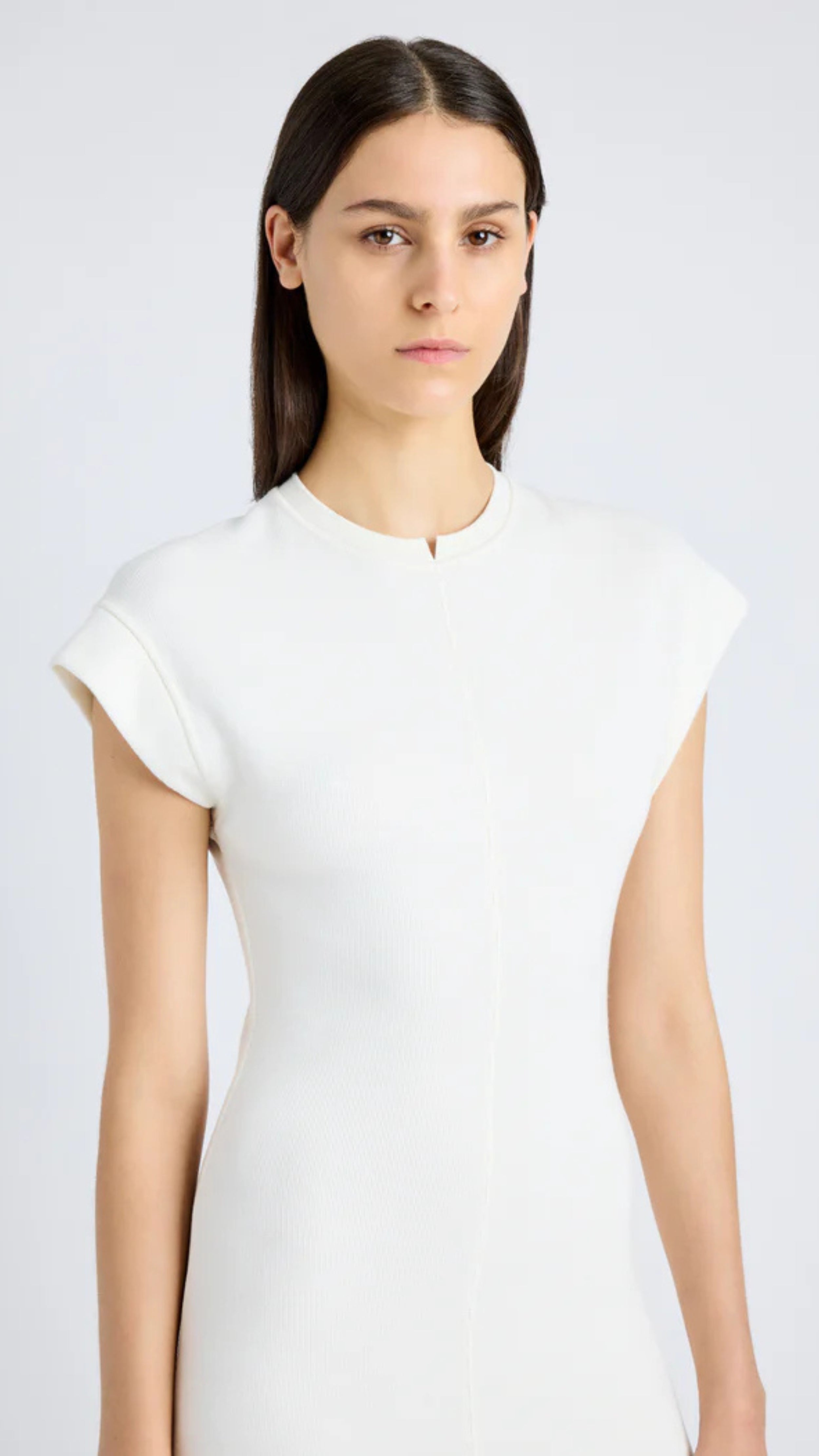 White Melanie Dress in Souffle Rib with crew neckline, cap sleeves, and slim A-line silhouette, by Proenza Schouler.