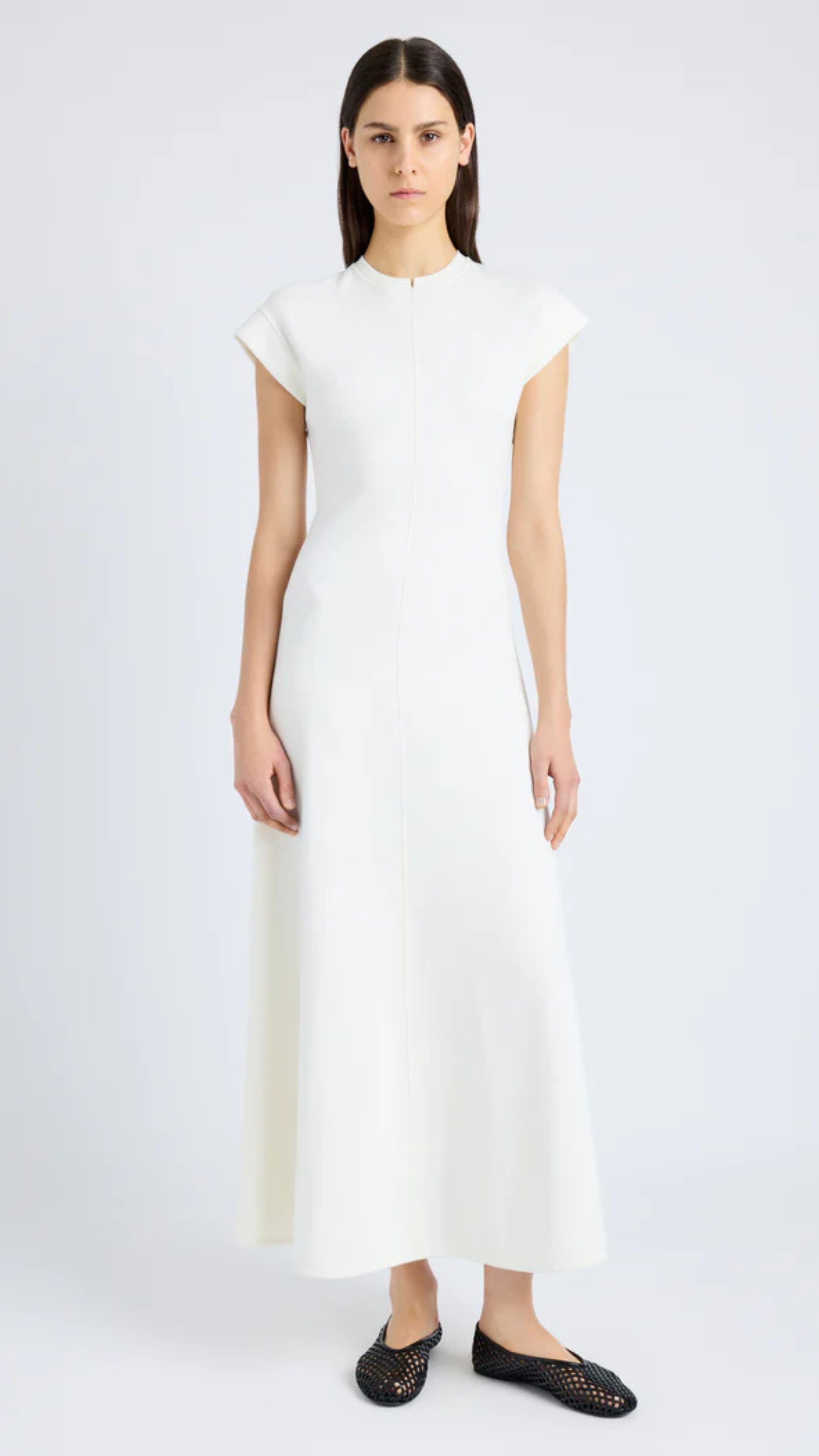 Melanie Dress in Souffle Rib with crew neckline, cap sleeves, and long A-line silhouette in white by Proenza Schouler.