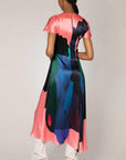 Roksanda Adriana Dress in pink, blue, green organic painted pattern. With a round collar neckline, short sleeves and skirt that falls to midi length. Photo shown on model facing back.