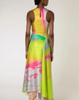 Roksanda Zenobia Dress. Fresh modern style silk twill dress in neon limes, pinks and soft blue. With an racer back style top, asymetrical dropped waist and midi length loose fitting skirt. Shown on model facing back.