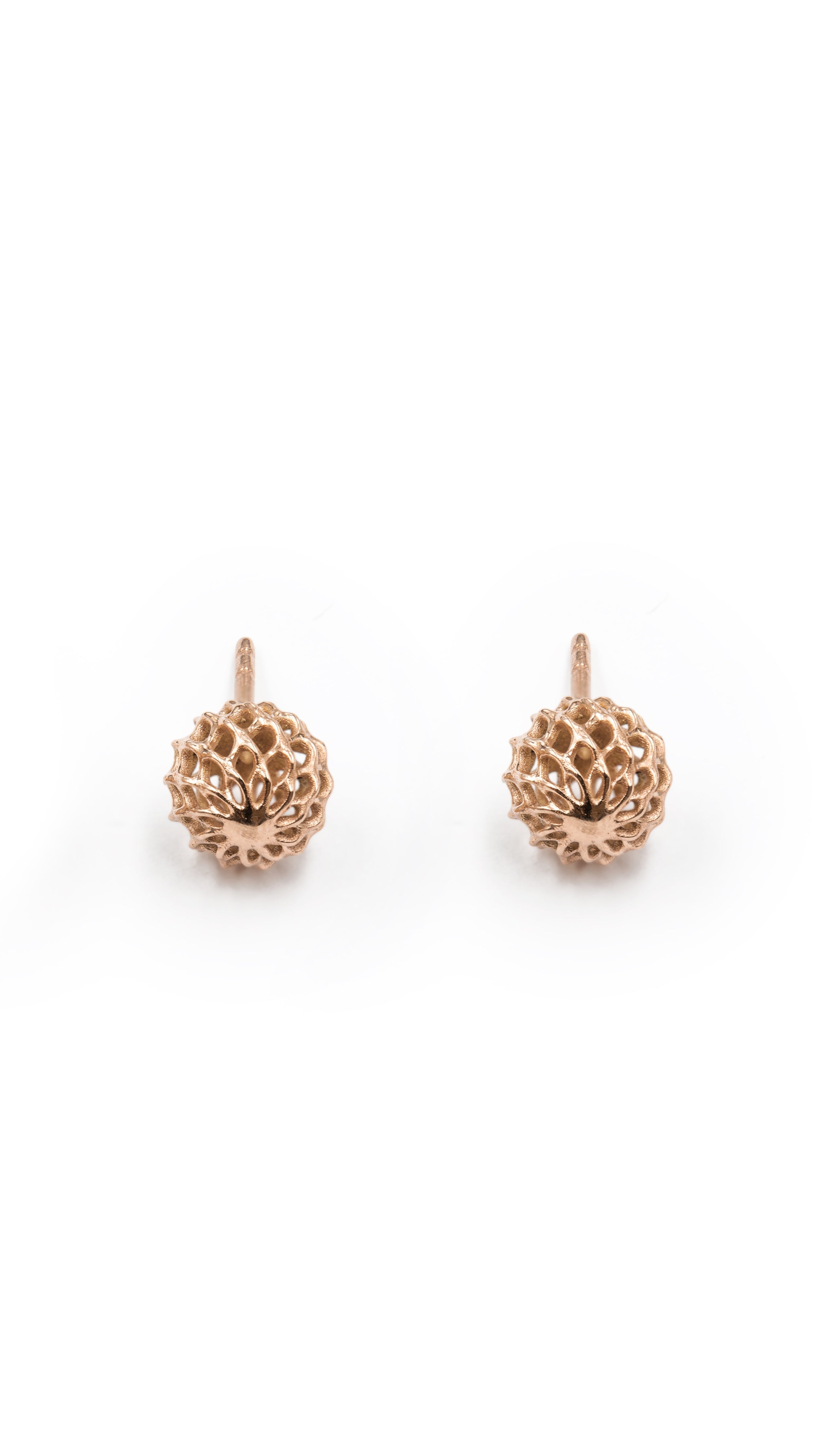 Iva Stud Earrings in 18K rose gold with lattice shell design, showcasing woven architectural style by Sian Jewels, fine jewelry.