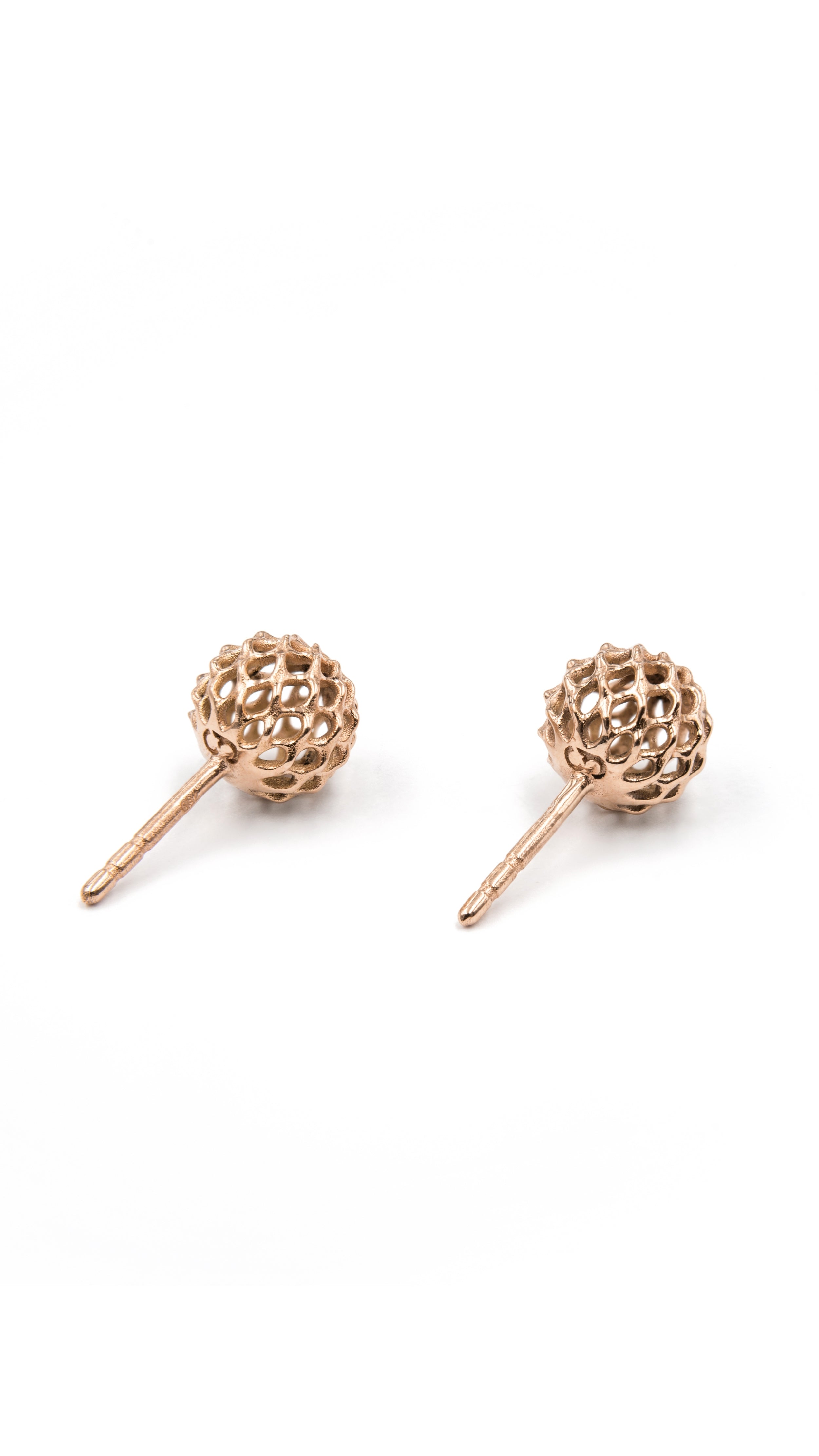 18K gold Iva Stud Earrings with woven lattice design, fine jewelry by Sian Jewels showcasing architectural craftsmanship.