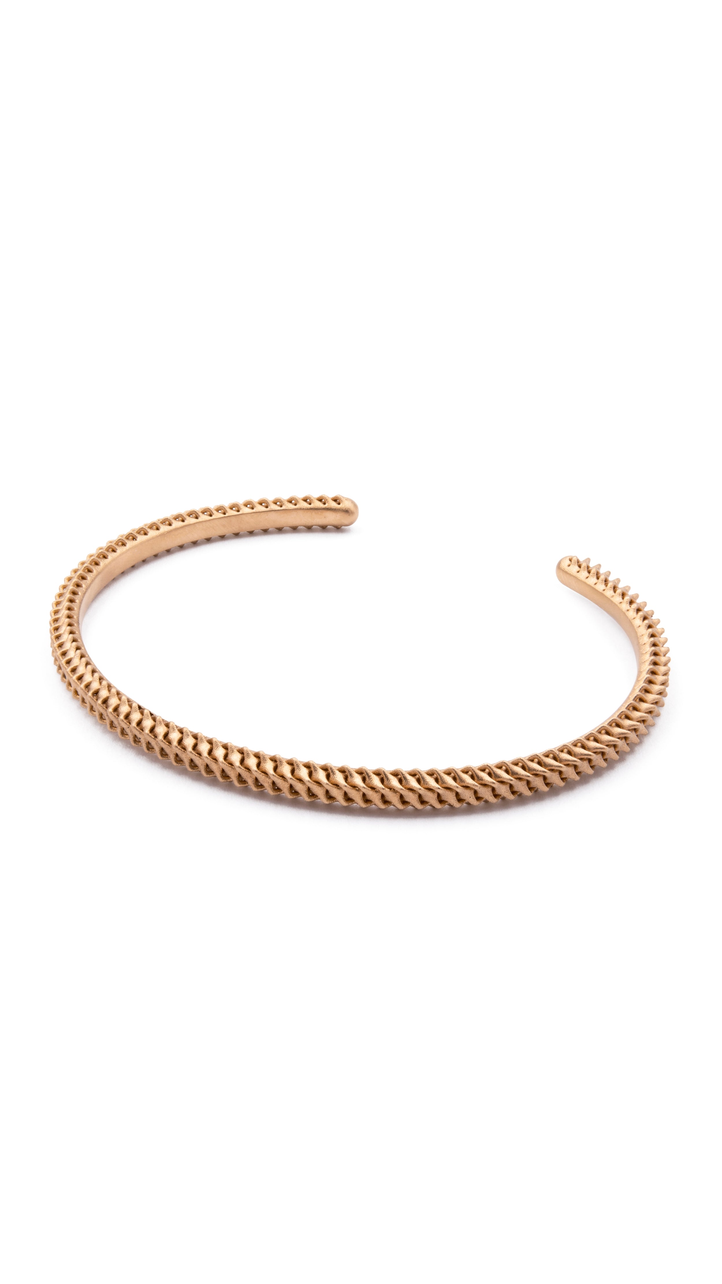 18K gold bangle bracelet with interwoven grid-like shells, smooth inner surface, and modern architectural design.