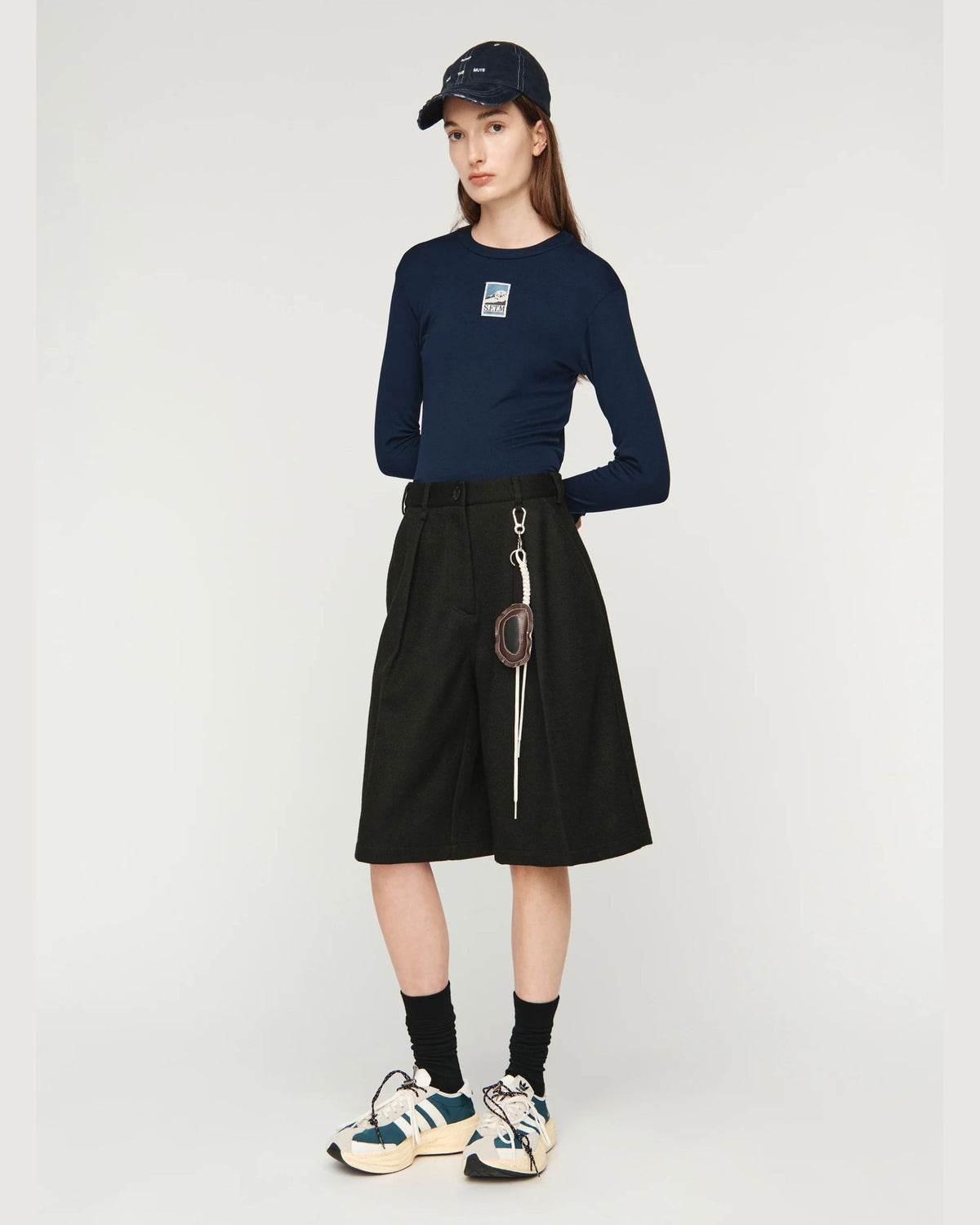 Song for the Mute Super Baggy Short in Petrol Black, side view on model