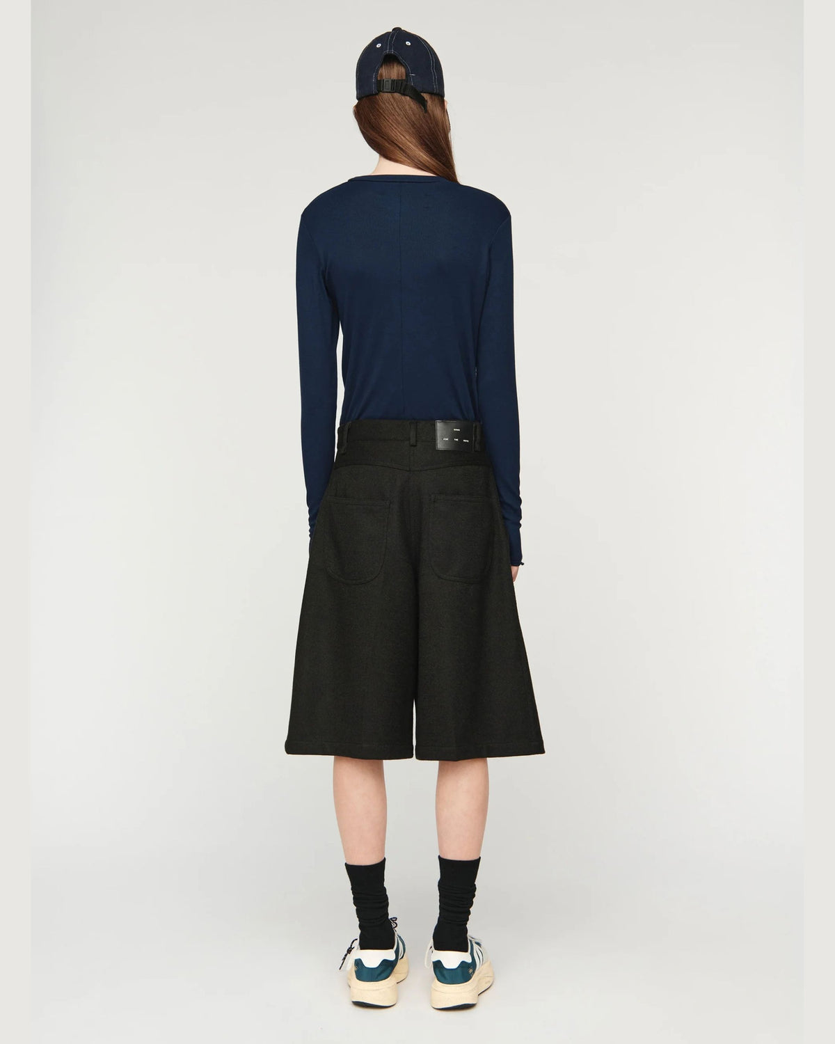 Song for the Mute Super Baggy Short in Petrol Black, back view on model