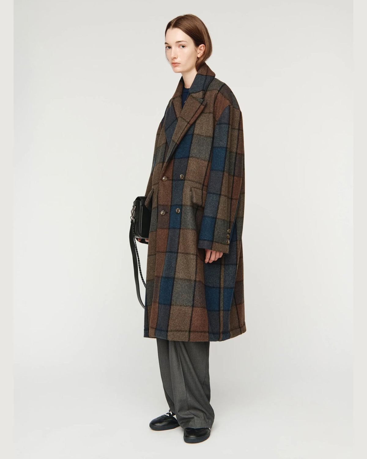 Song for the Mute Double Breasted Overcoat in Bear Check, side view on model