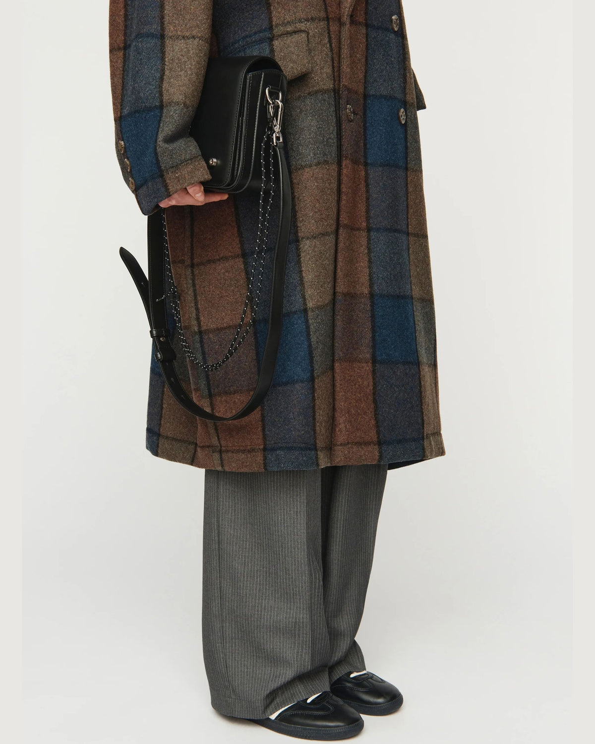 Close-up front view of button and pocket detail, Song for the Mute Double Breasted Overcoat