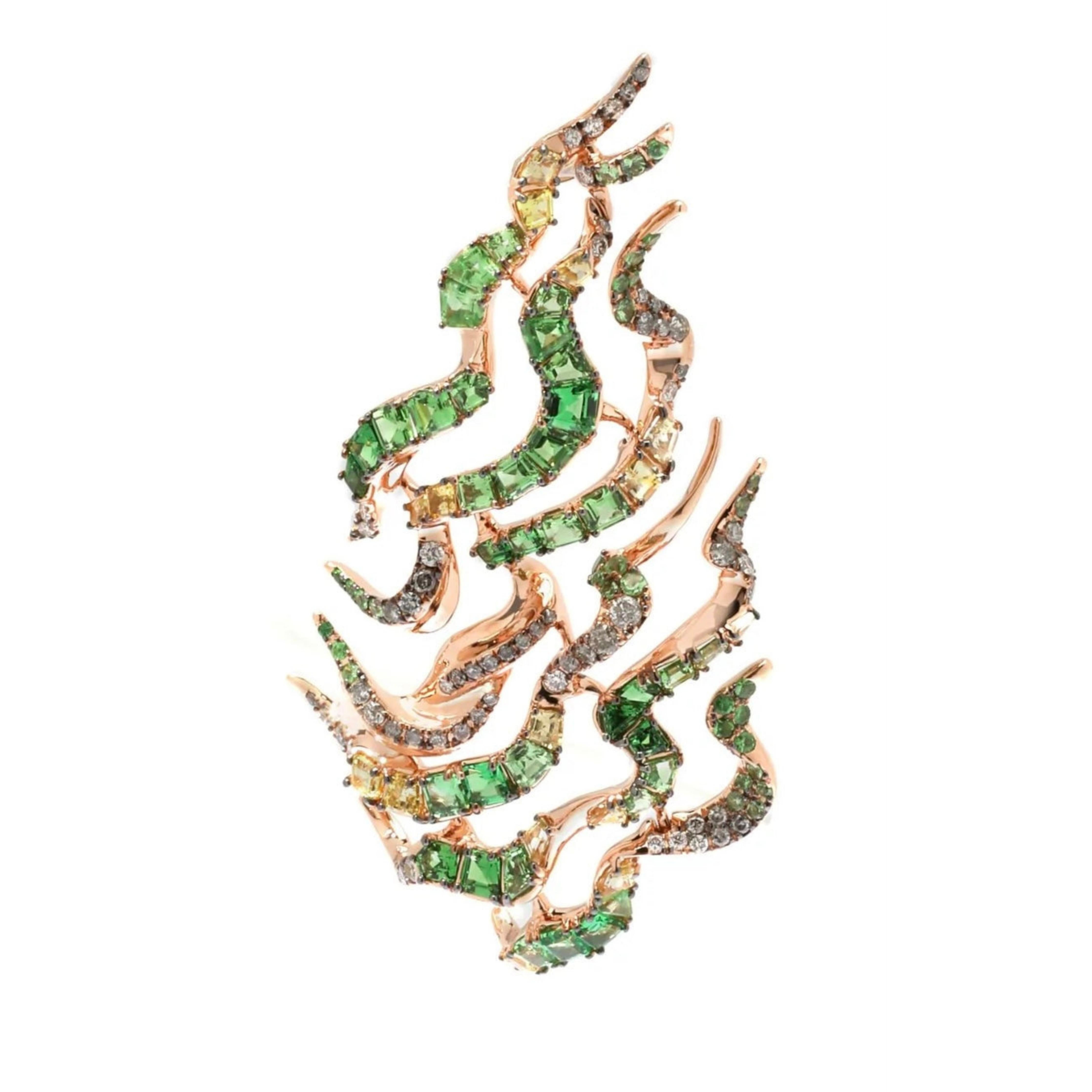Bibi van der Velden Tsavorite Single Smoke Haze Earring. Crafted from multiple tsavorites, white and grey diamonds, and yellow sapphires and set in 18K Rose Gold this single earring invokes the beauty of a swirling haze of smoke. Shown from the front.