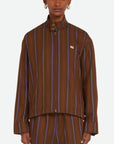 Wales Bonner Life Jacket Italian-made jacket crafted from lightweight herringbone wool in deep brown and blue stripe colors. This coat features long sleeves and a front zipper. Shown on model facing front.