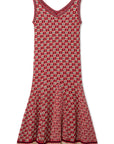 Wales Bonner Soar Godet Dress Woven in an light weight summer Italian cotton knit. This midi length dress has a checkered pattern in red, ivory and black. It has a v-neckline and slightly flared skirt that falls just below the knee. Product flat photo.