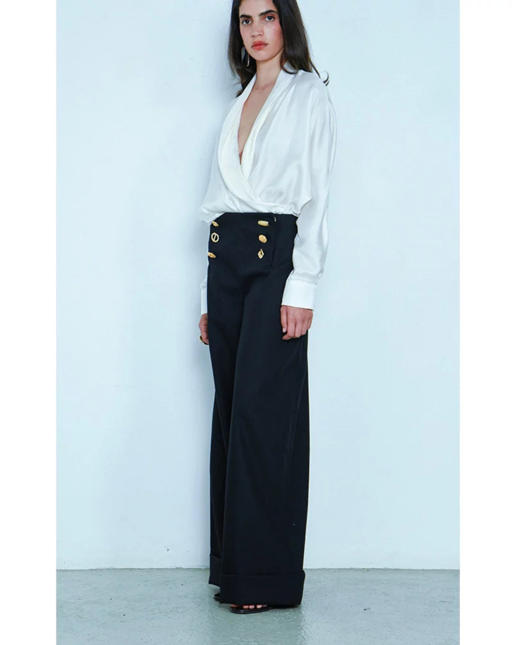 Side view highlighting high waist and relaxed drape