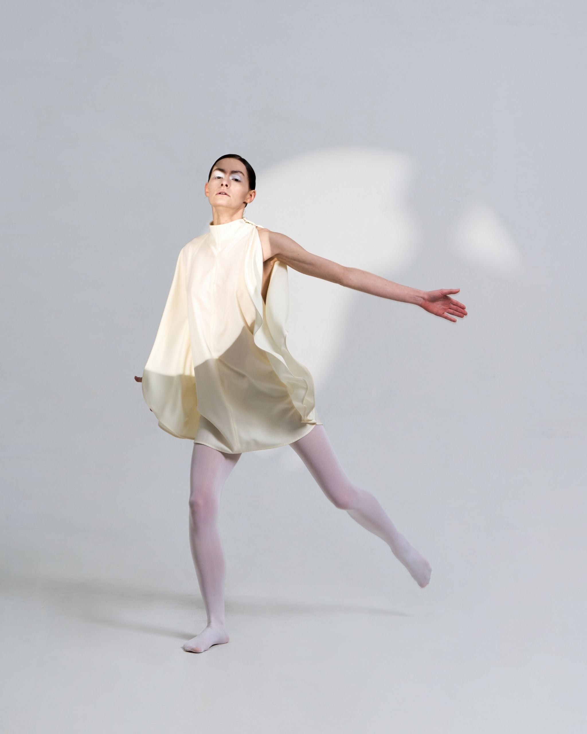 JINSUN Filante Cape Blouse editorial image with movement.