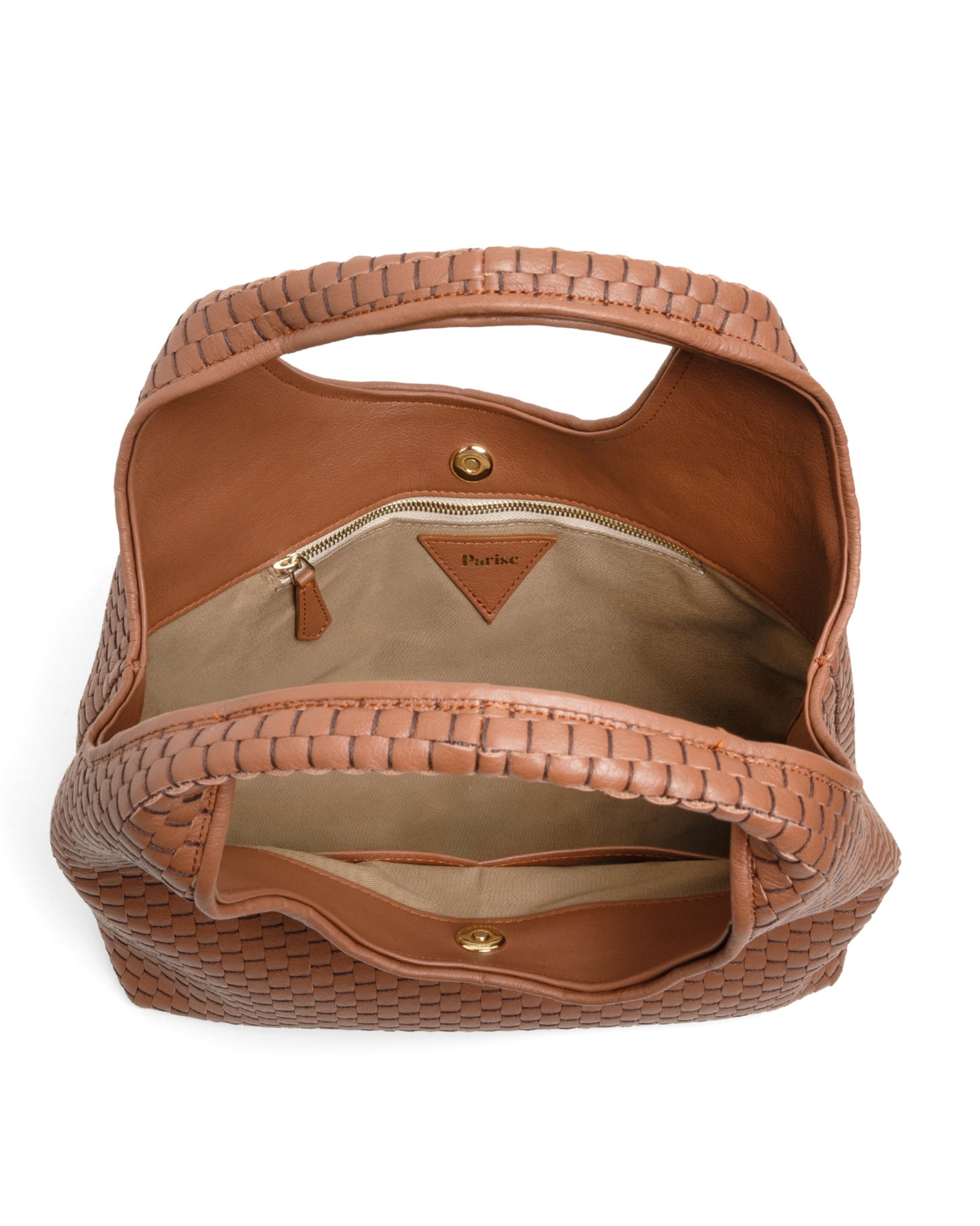 Inside of the Parise ‘1312’ Handbag in Chianti featuring soft cotton lining, internal zip pocket, and leather compartments.