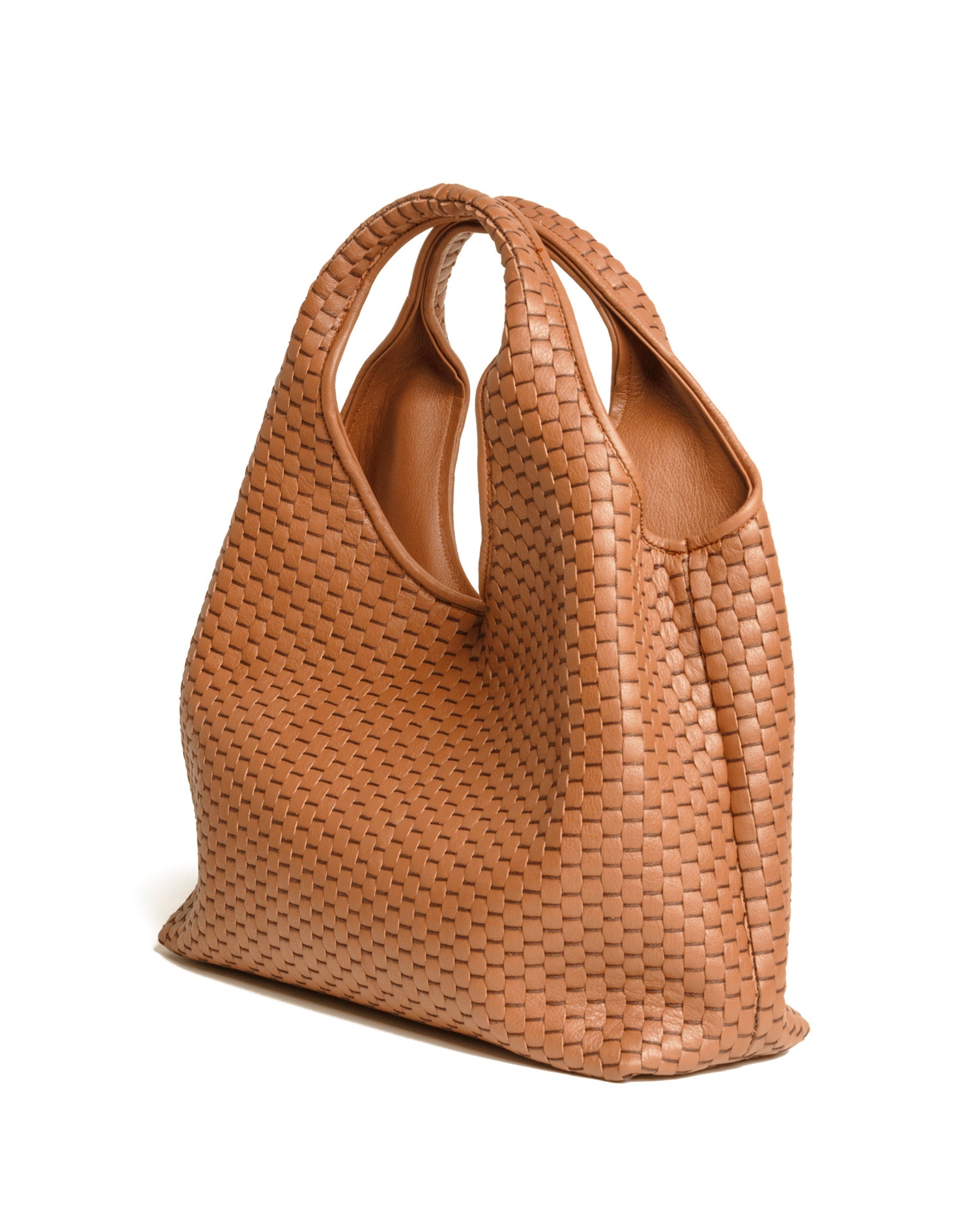 Three-quarter angled view of the Parise ‘1312’ Handbag in Chianti showing sculpted handles and woven craftsmanship.
